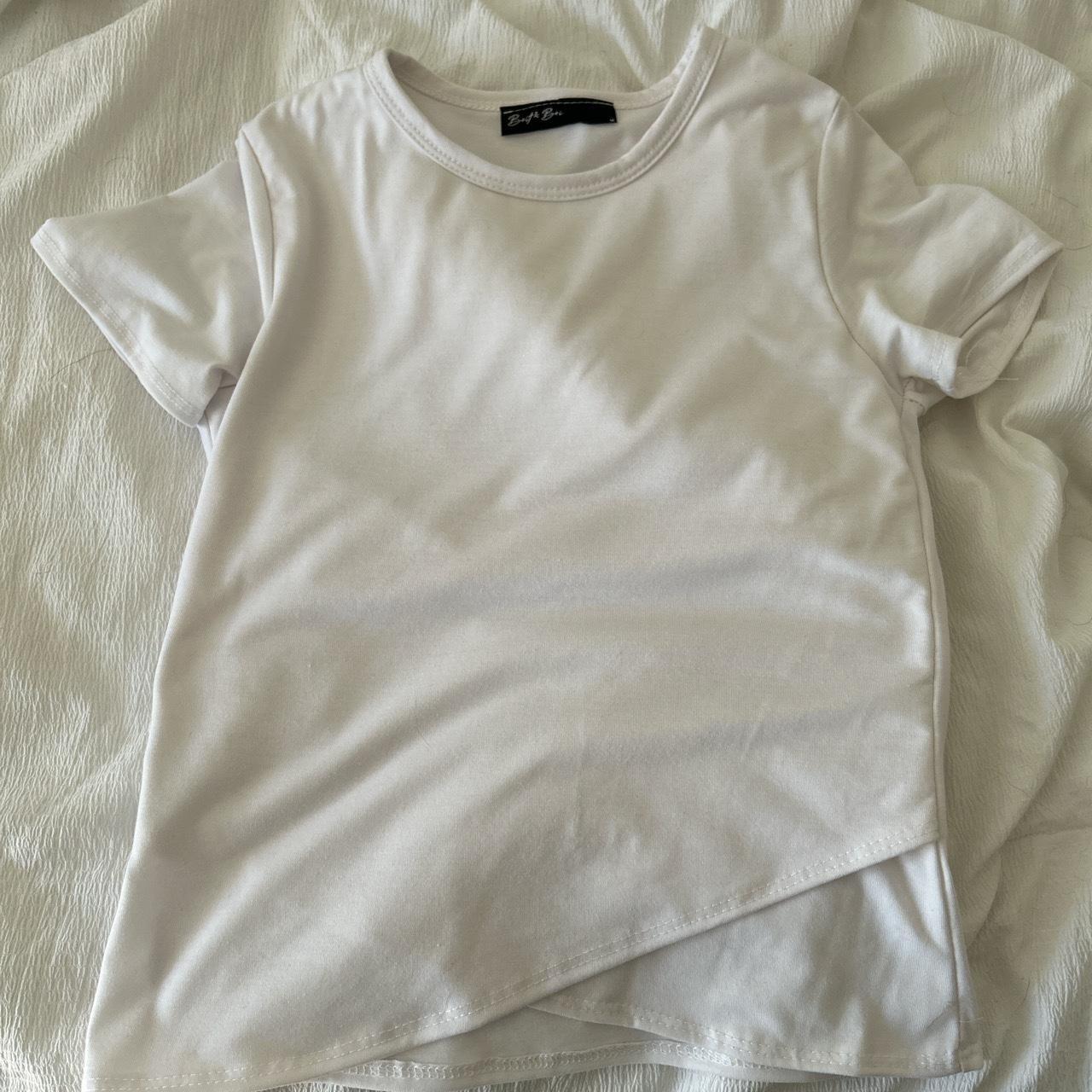 White crossover tee. Size medium but fits like a... - Depop