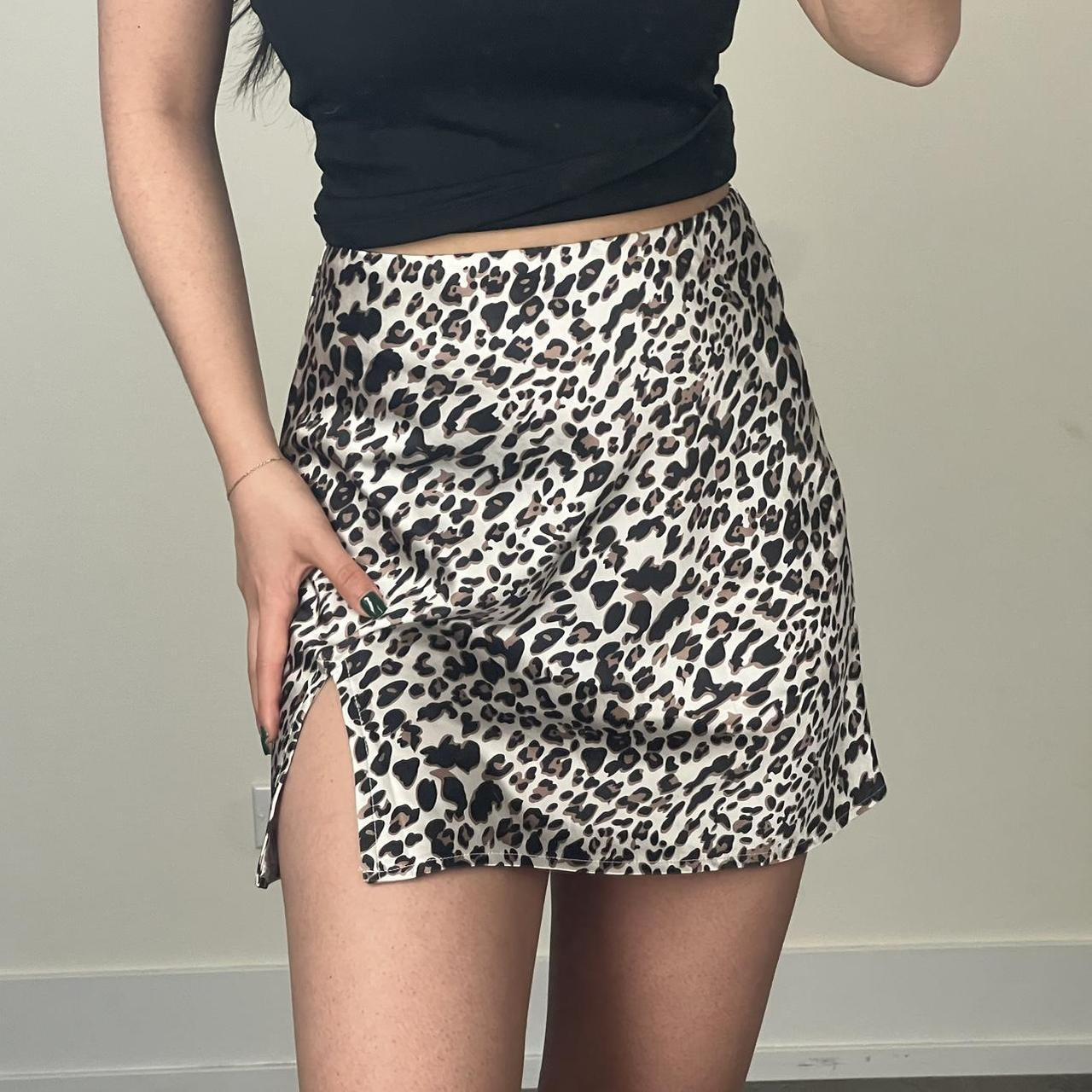 Leopard print satin mini skirt in black and. Depop