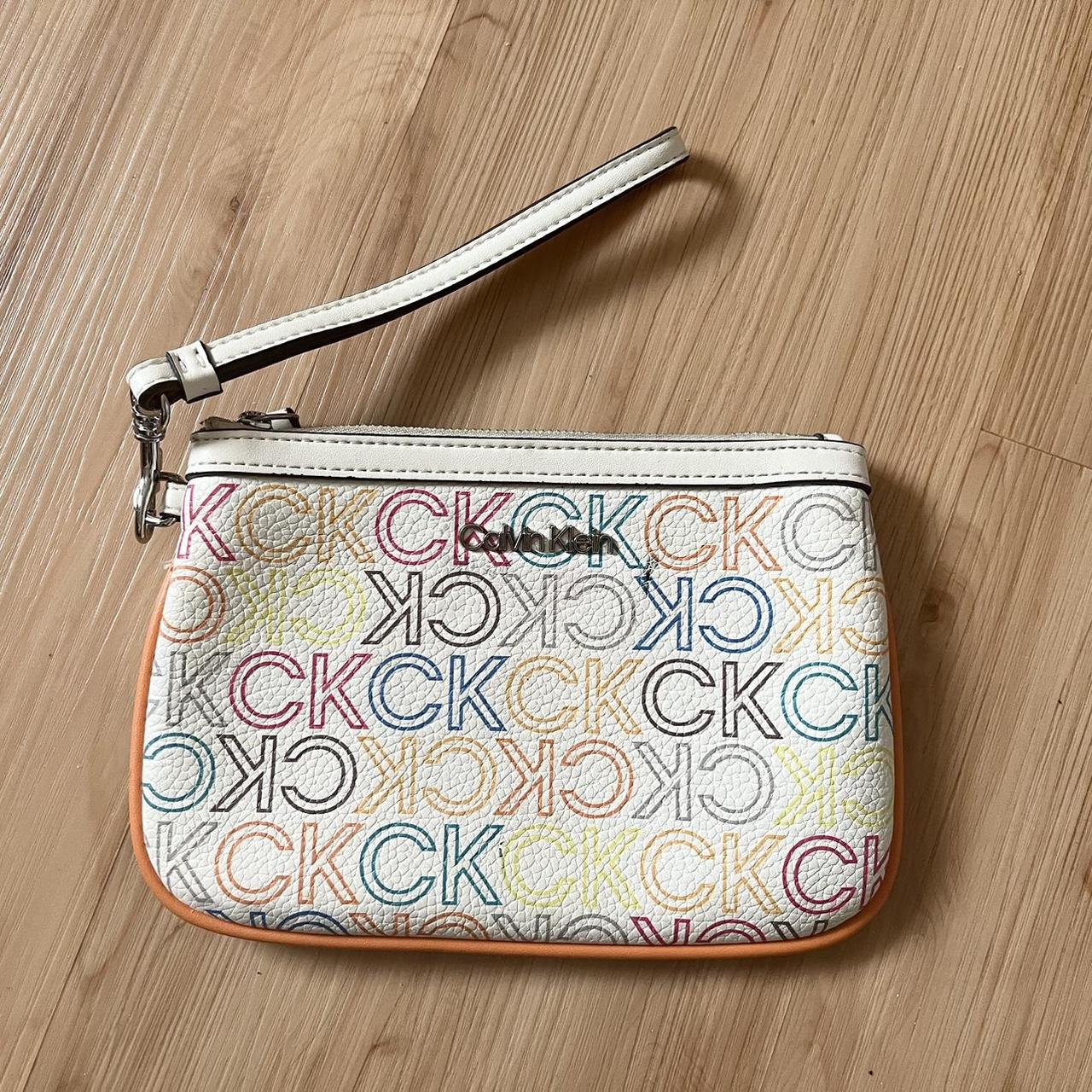 Calvin Klein Women s Ck Signature Wristlet Clutch. Depop