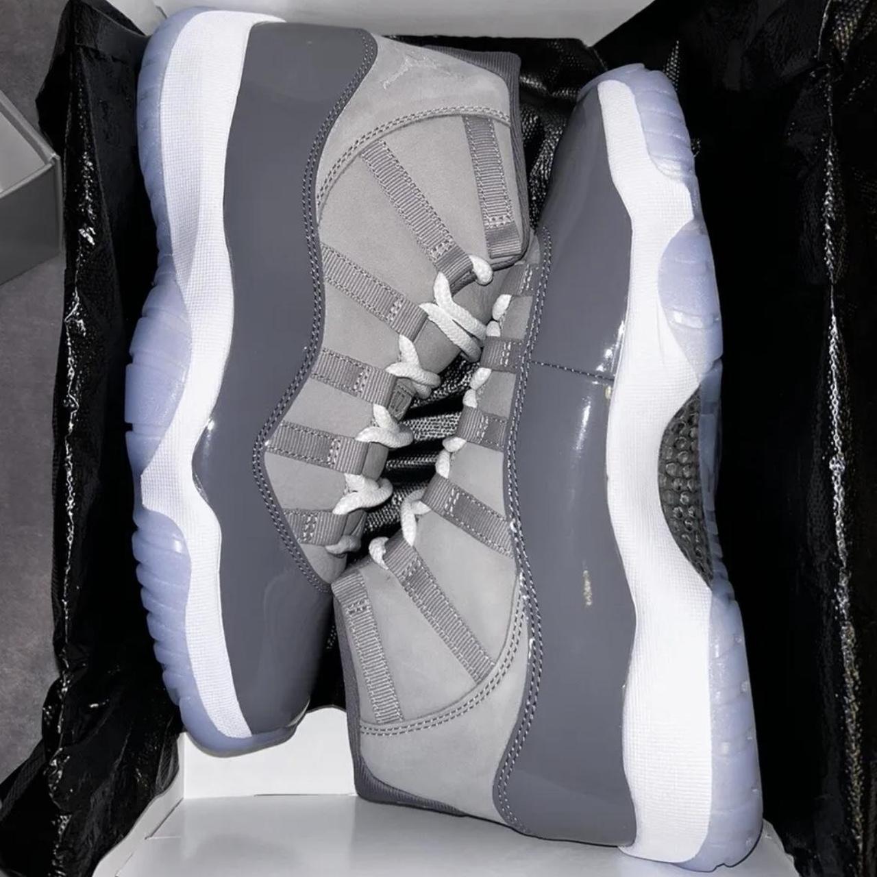 grey and white jordan 11