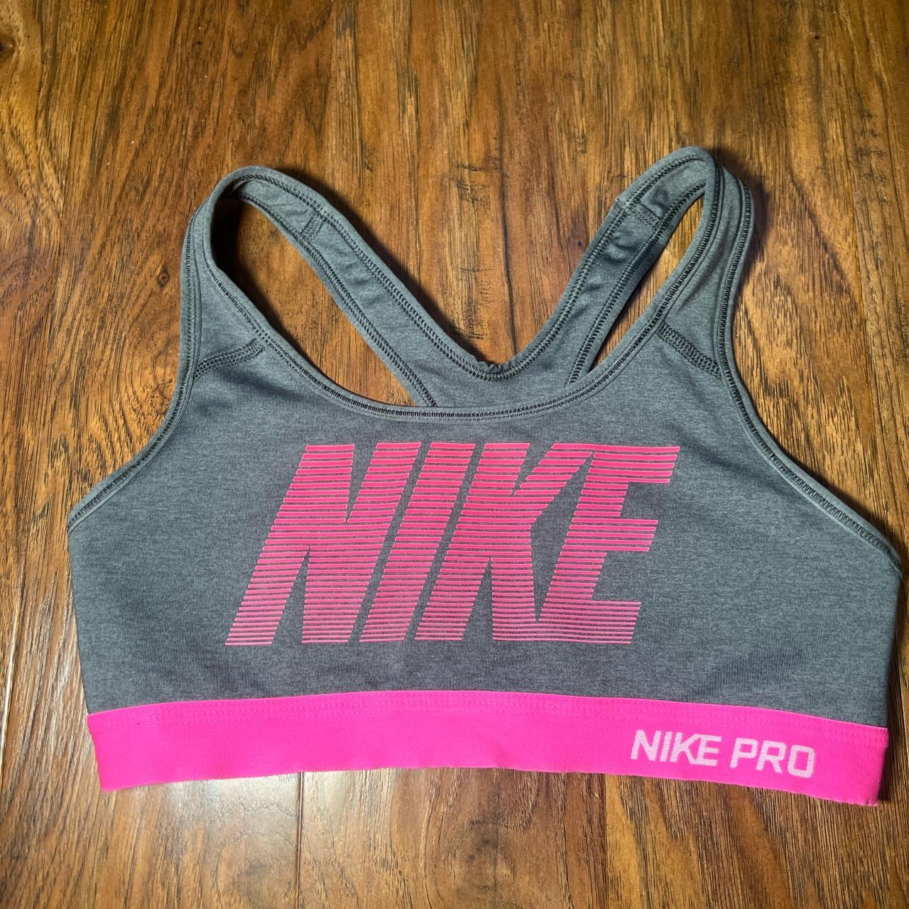 Small grey Nike sports bra. No inside padding. In