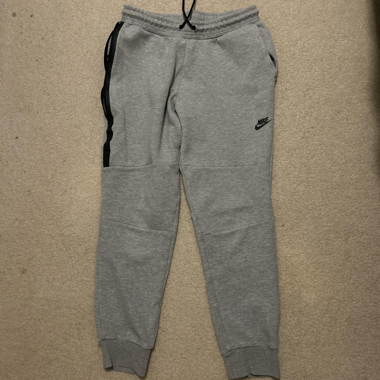 Grey Nike Tech Pants No zipper to pocket Size large - Depop