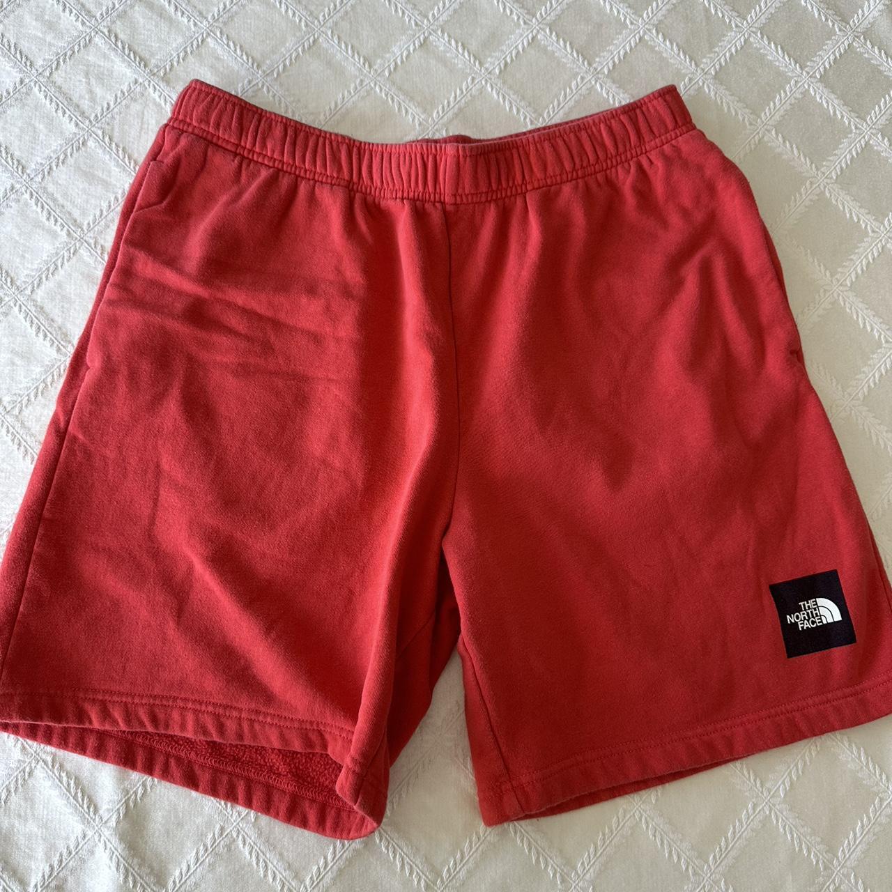 Red north face shorts deals