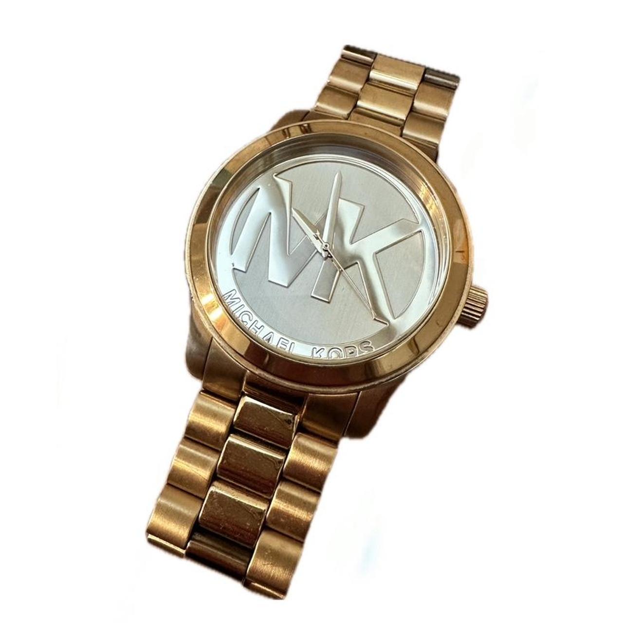 Gold Tone Michael Kors Watch Good used. Depop