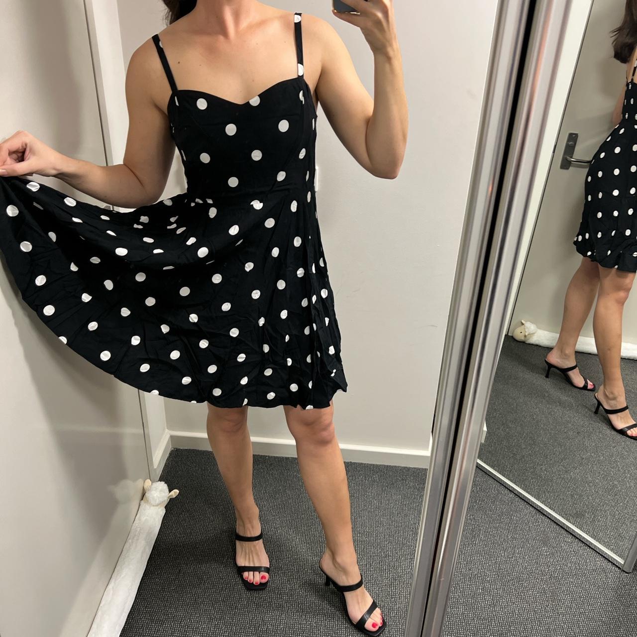 Size L black and white polka dot dress from Old. Depop