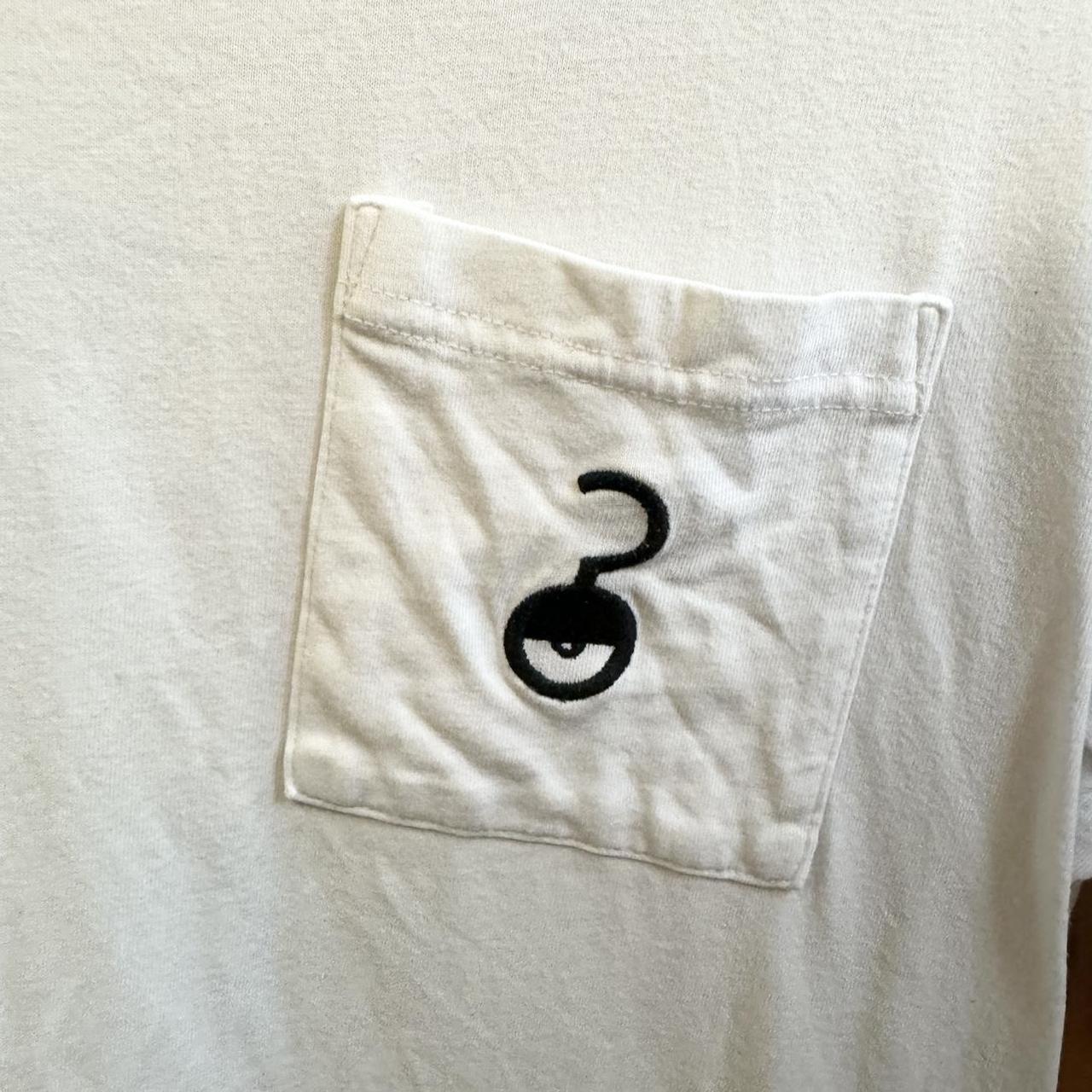 Pokémon Unown Eye Test Uniqlo White Pocket Graphic | Depop