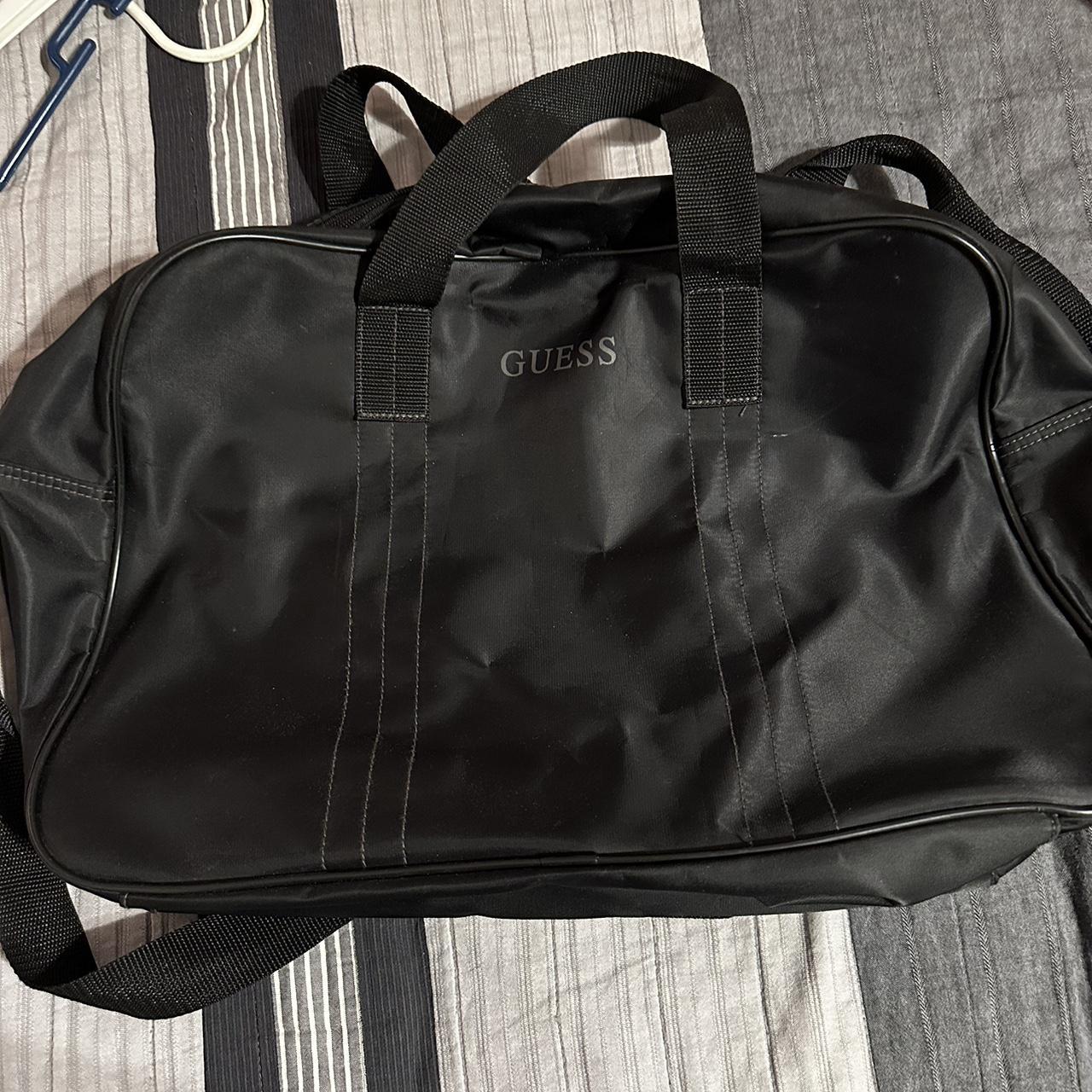 Guess duffle bag. zippers are great and fits a lot.... Depop