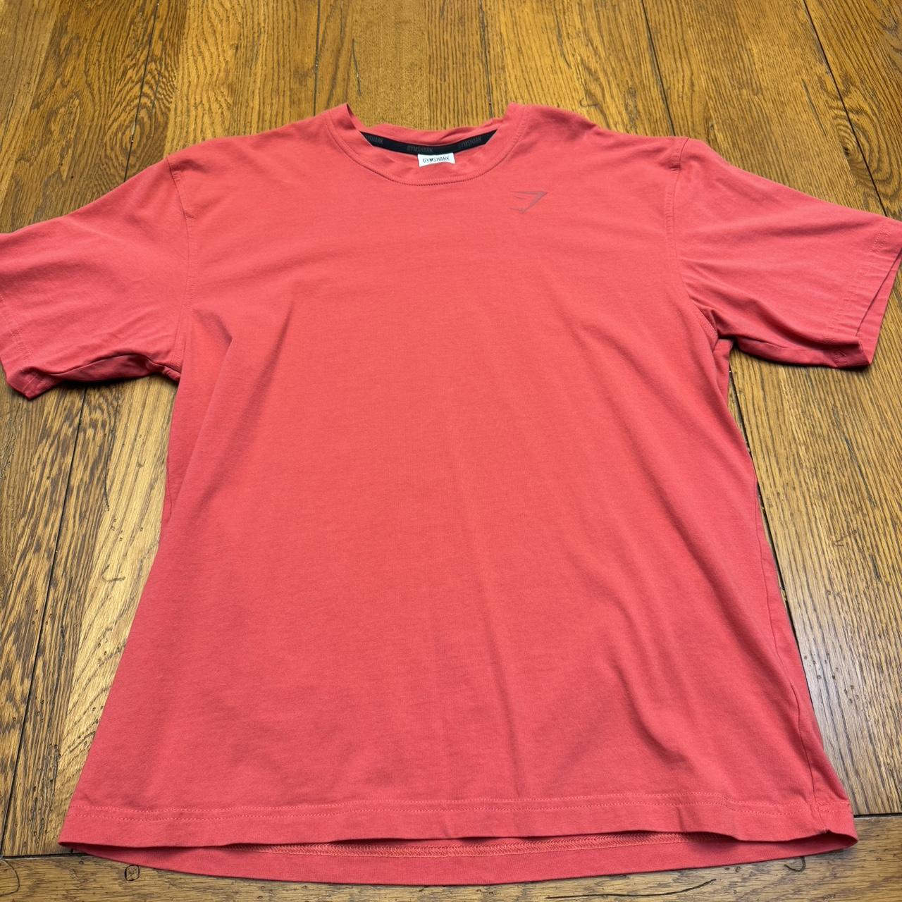 Red small (oversized fit) Gymshark shirt. Worn only... - Depop