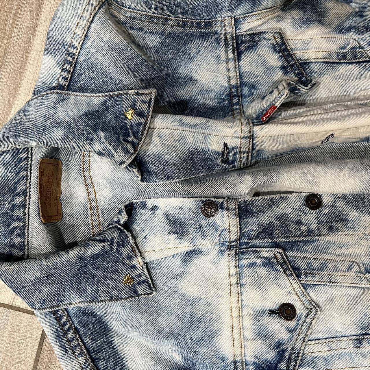 Levi s bleached denim jacket with fly studs on the