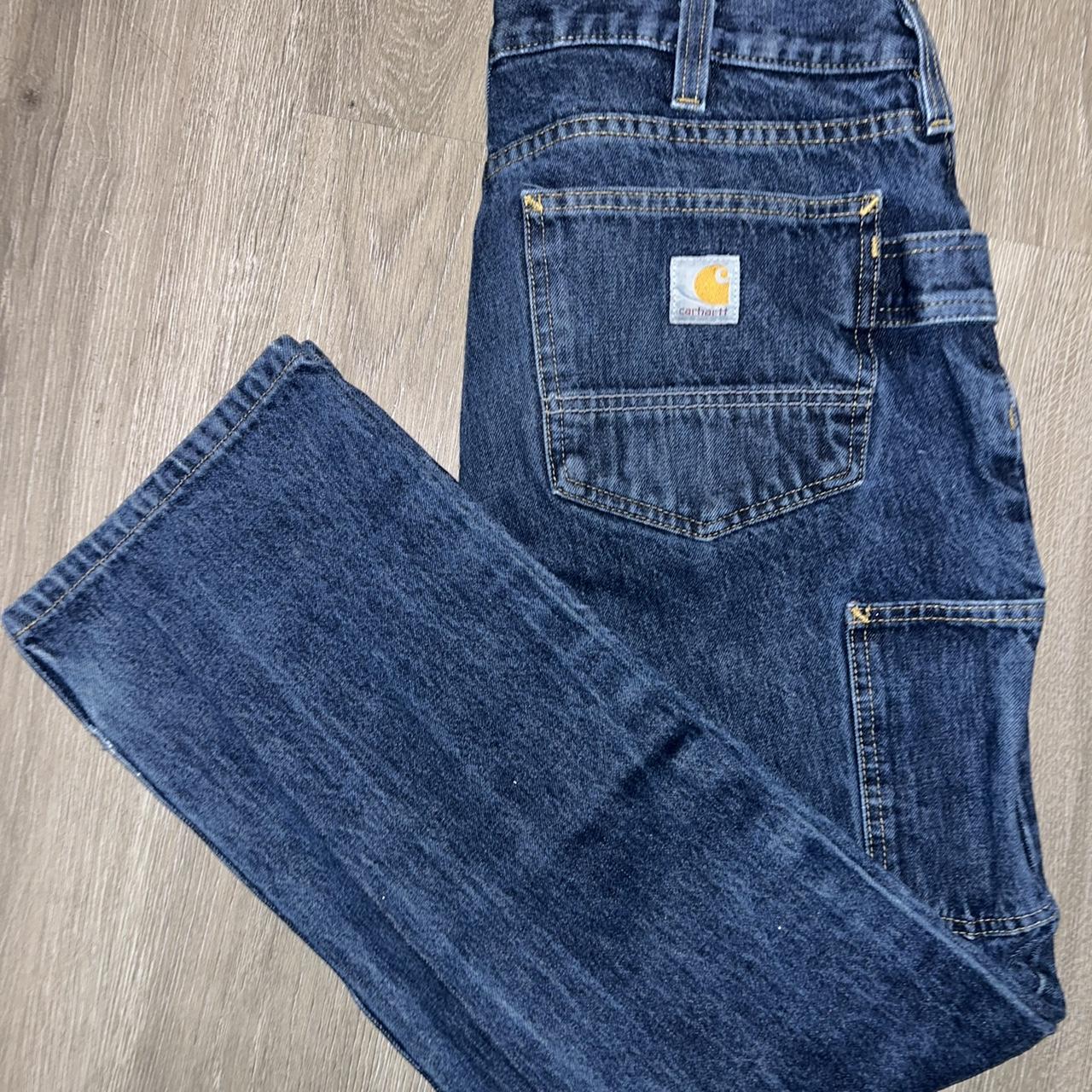 CARHARTT pants Worn a few times has a cut on right... - Depop