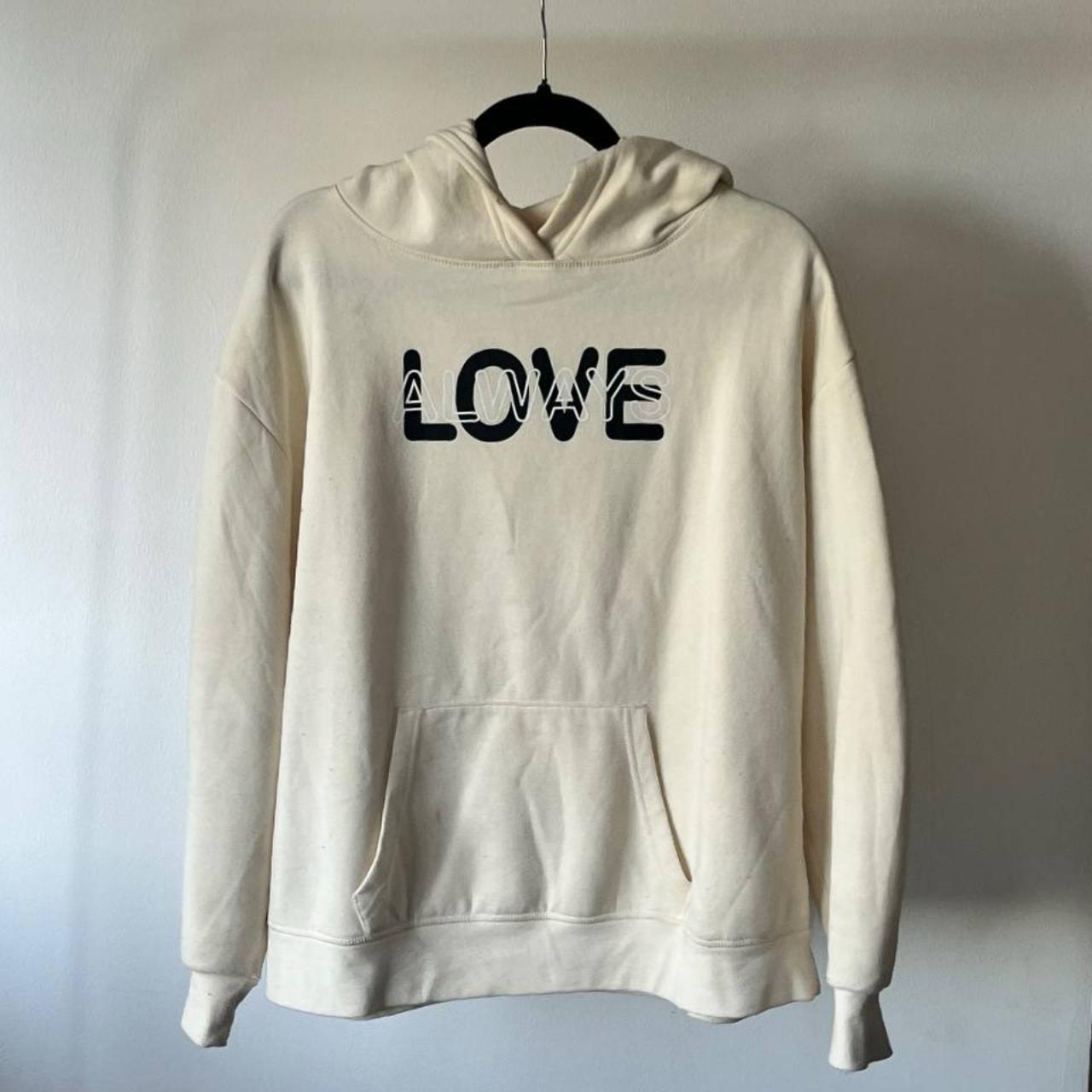 hoodie , loose , color is cream and quality is... - Depop