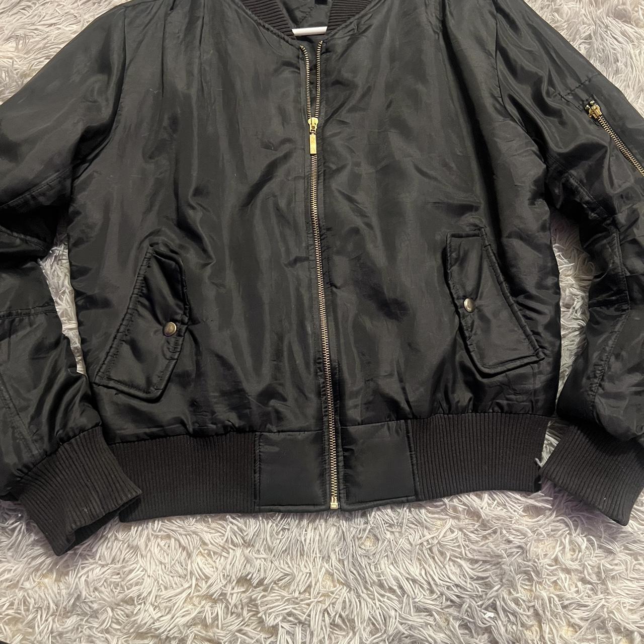 Black bomber jacket discount with gold zipper