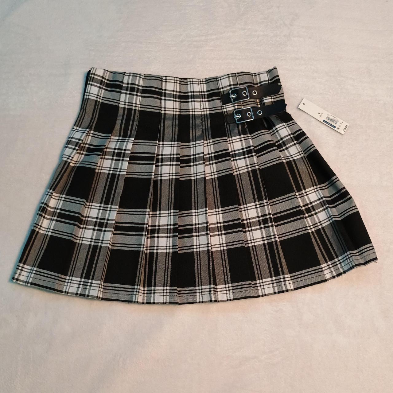 Black and white plaid mini skirt with black leather. Depop