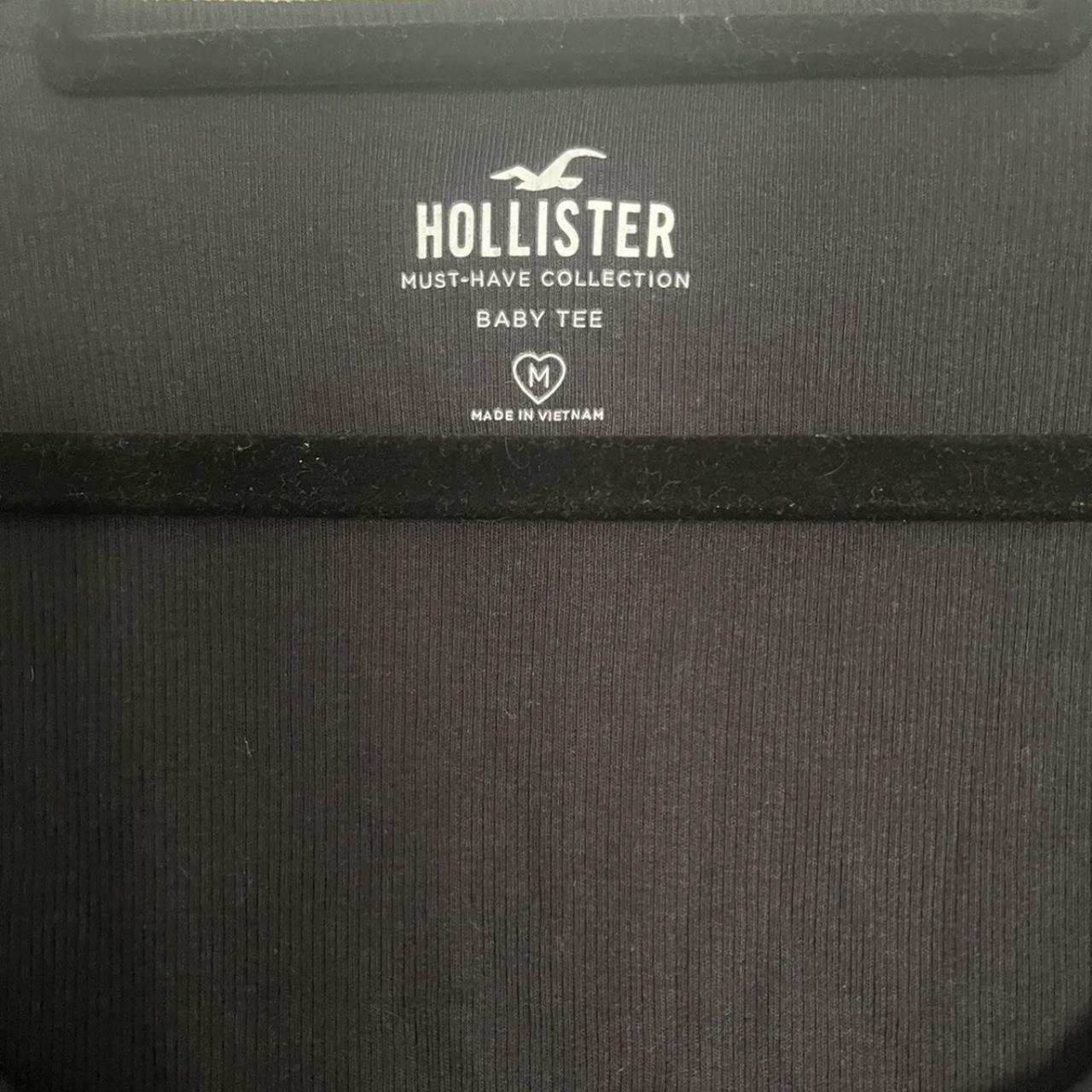Hollister baby tee black long sleeved, button front,... Depop