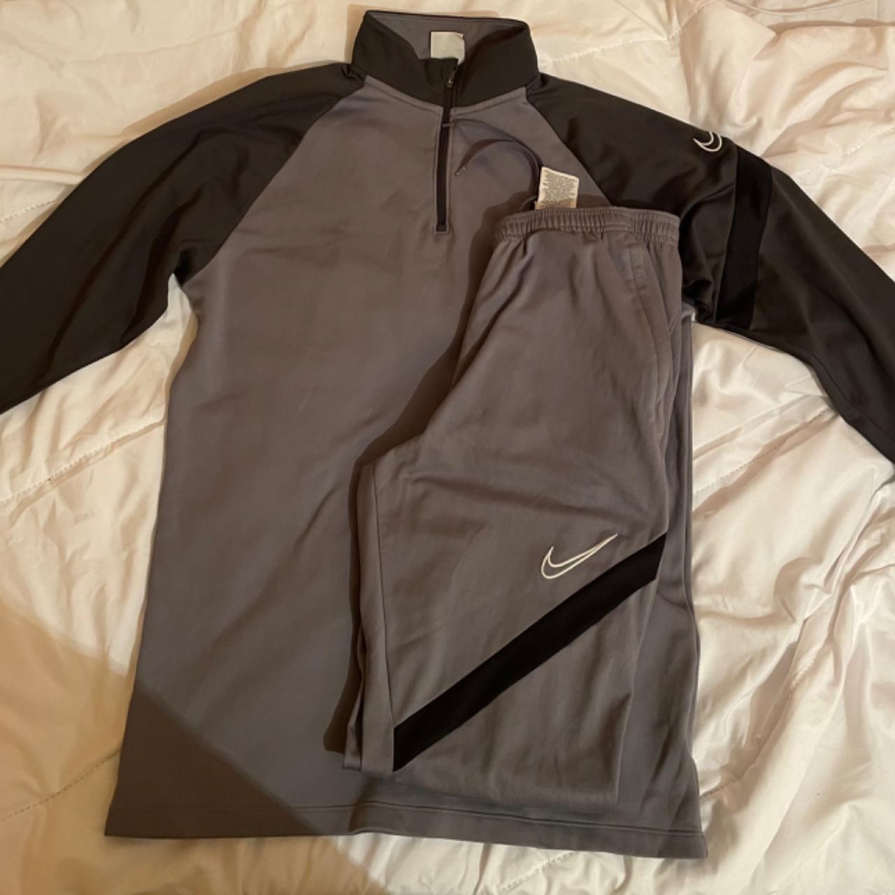 grey nike track suit
