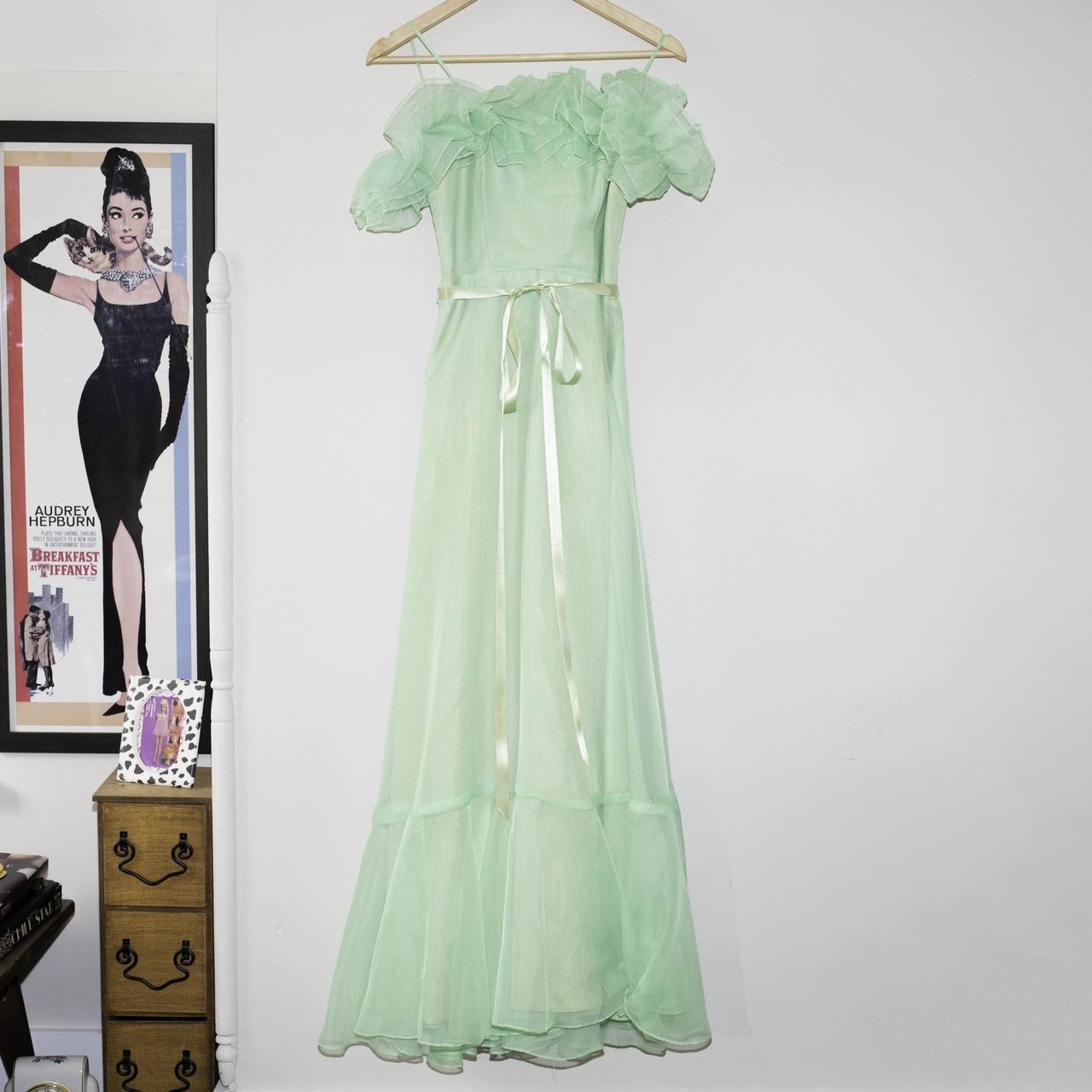 Green long gown with mesh overlay and ruffle details... - Depop