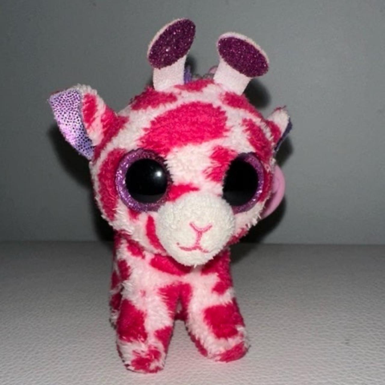 Pink stuffed giraffe on sale