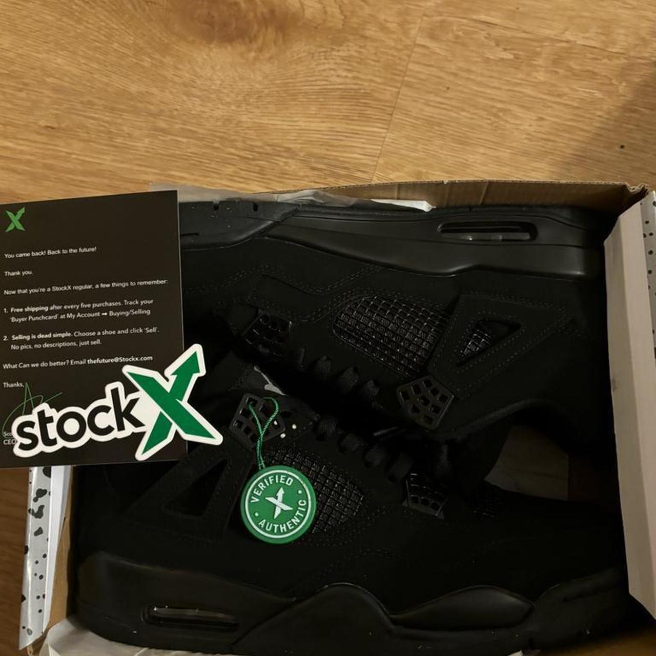 mens all black jordan 4