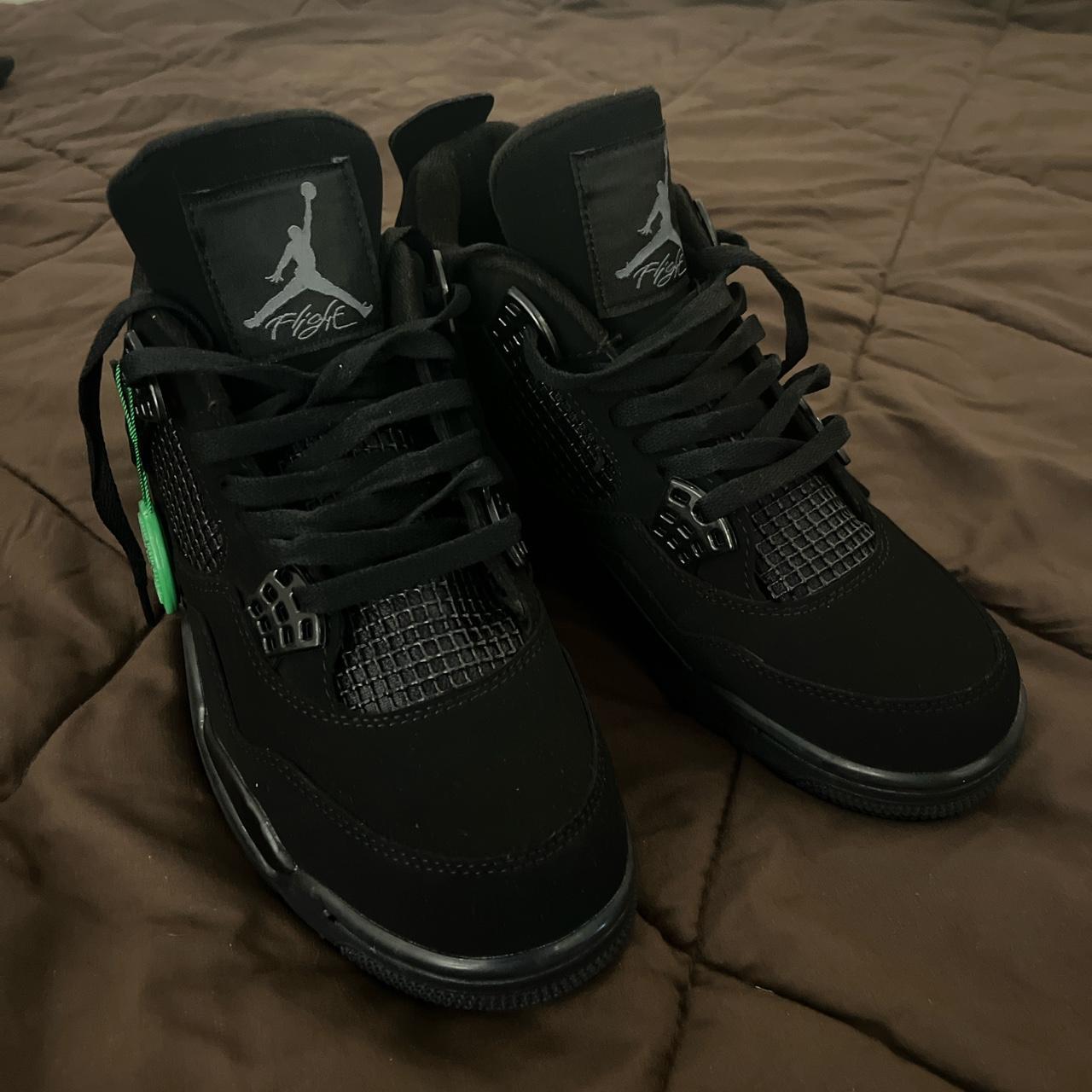 mens black cat 4s