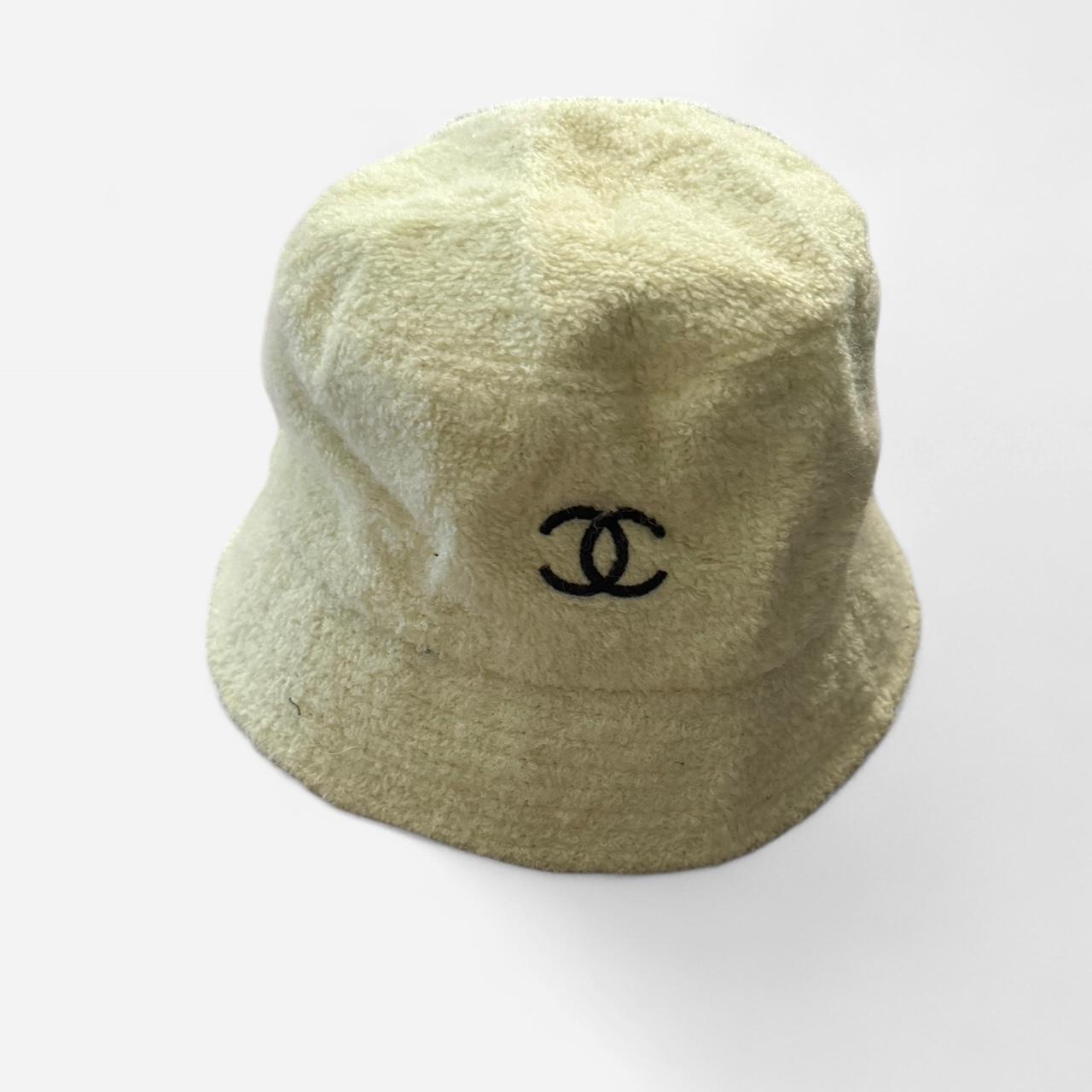 Super cute cream colored bucket hat with navy blue... | Depop