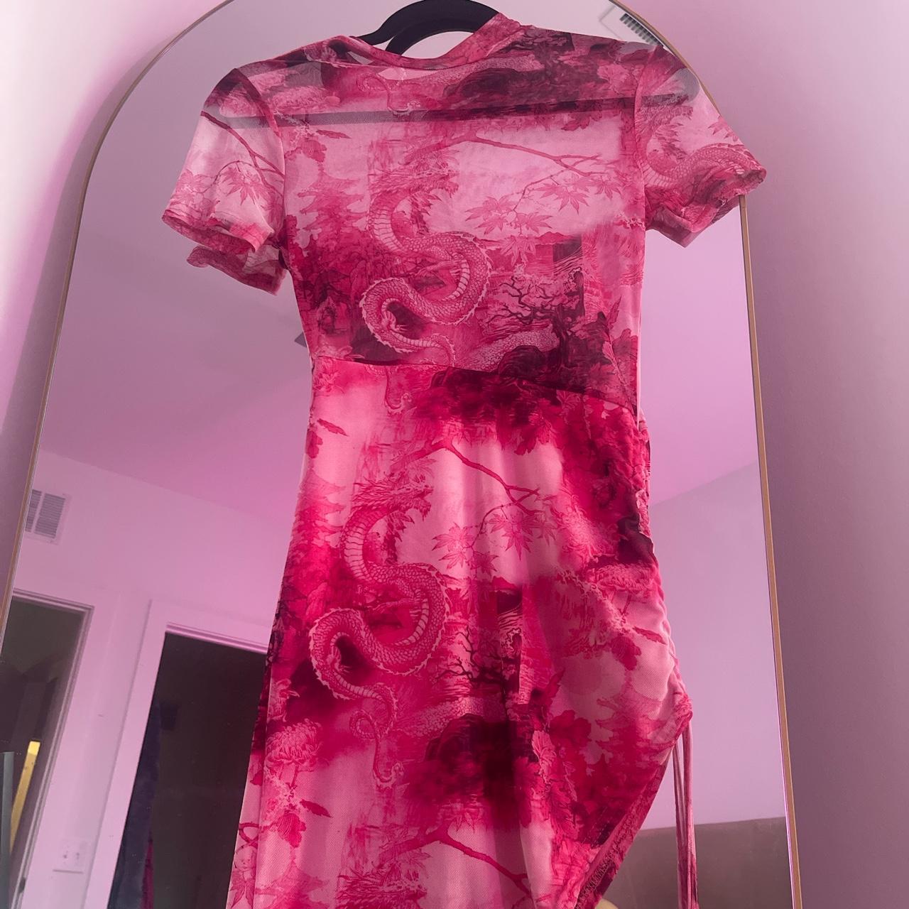 Small Asian themed pink dress with a slit, only