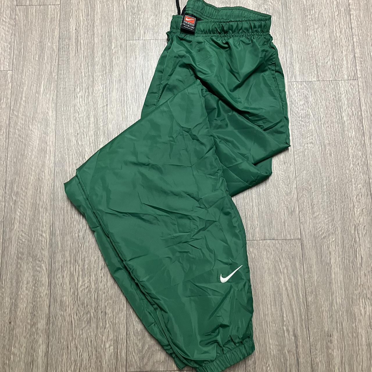 Nike swishy joggers hotsell