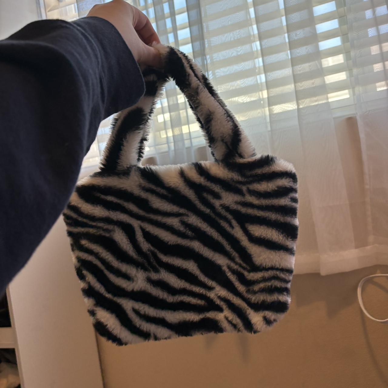 furry zebra mini bag. not my style anymore