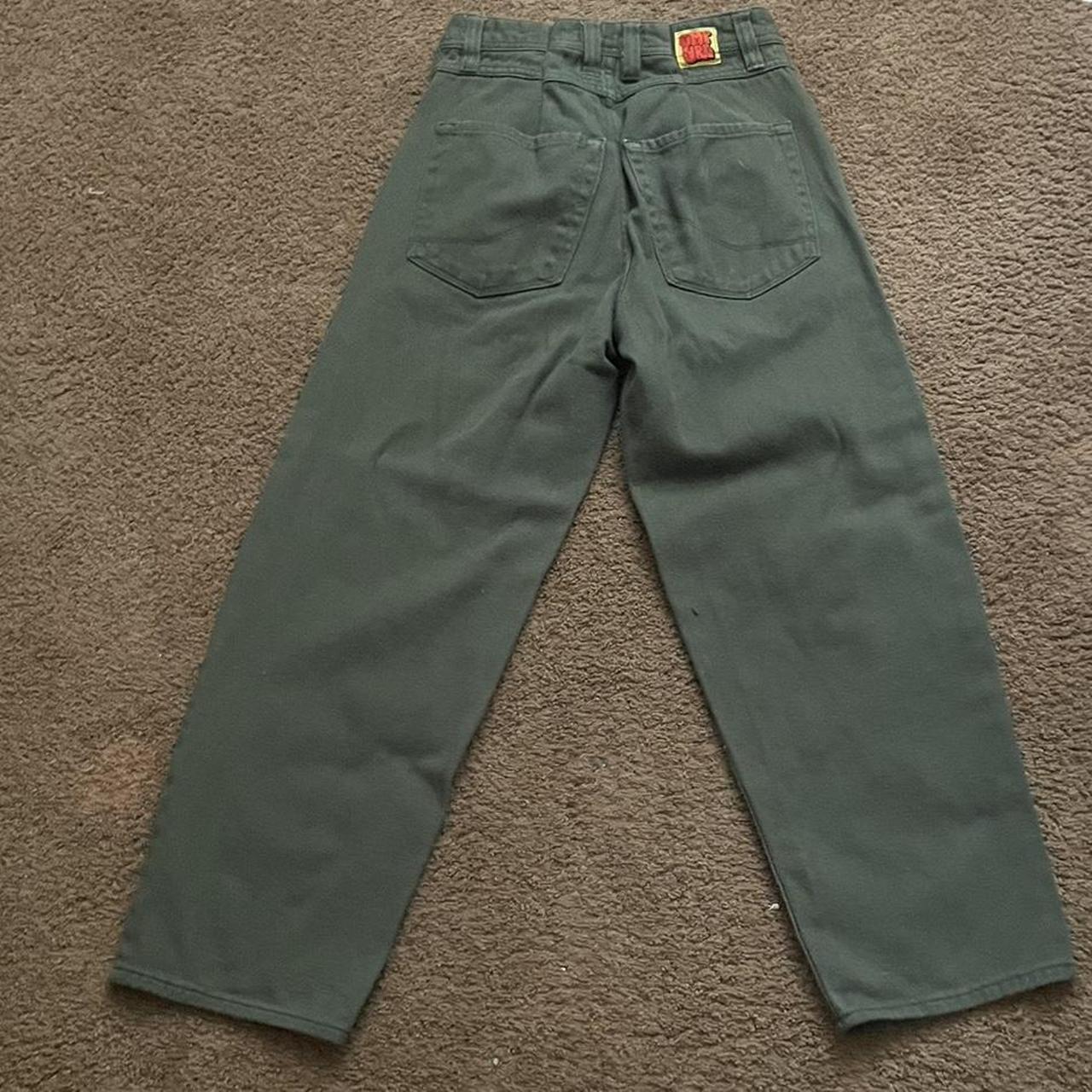 Dark forest green empire baggy pants they say a... - Depop