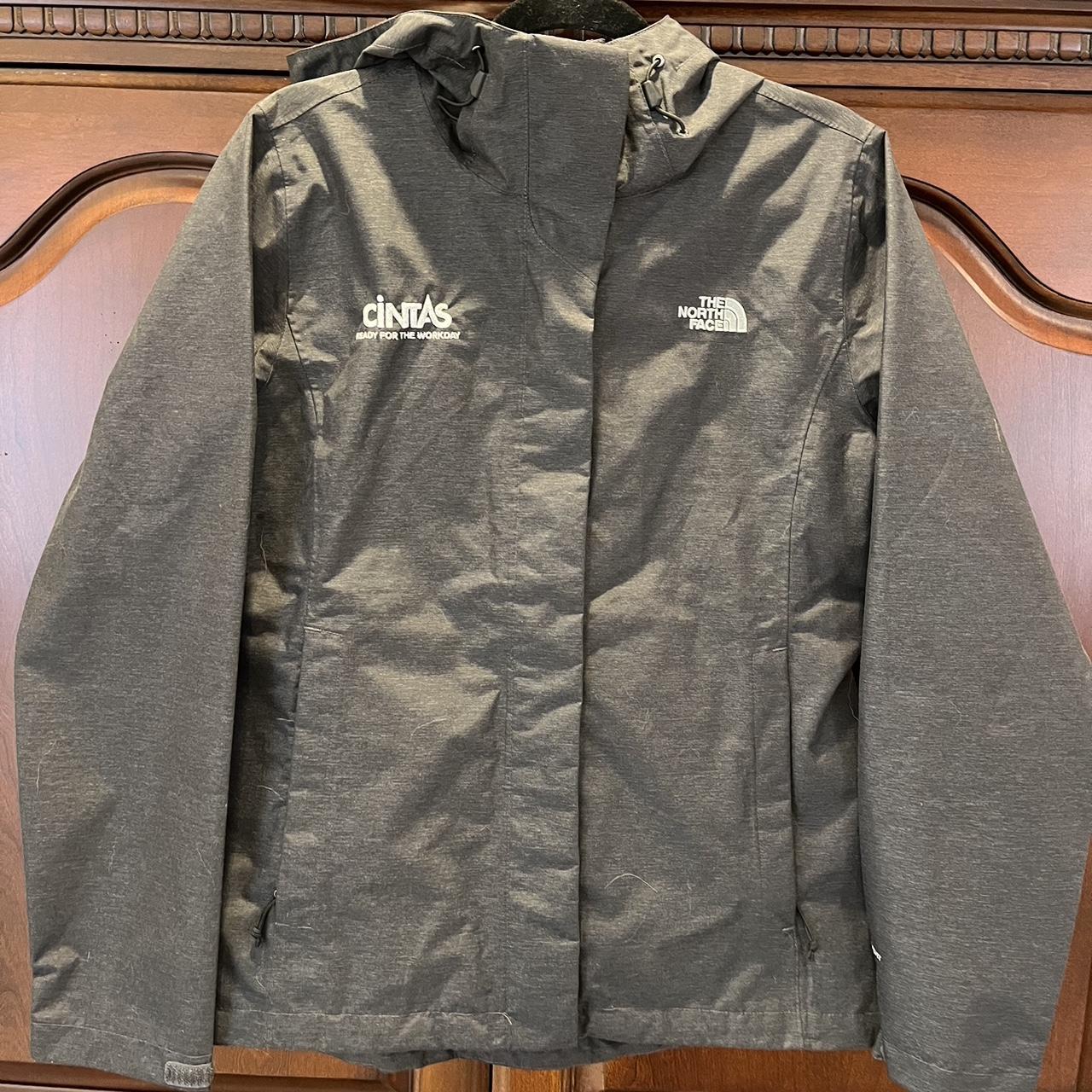 Charcoal colored North Face rain jacket, Cintas logo... - Depop