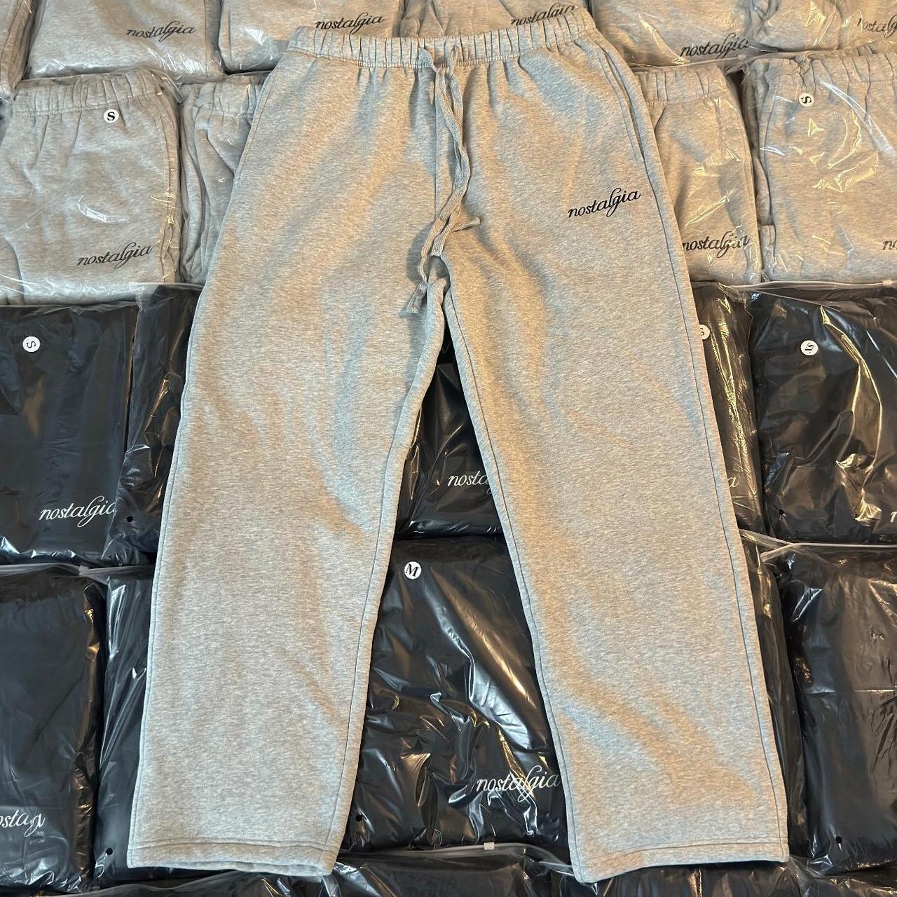 nostalgia sweat pants black- size M ( fits large... - Depop