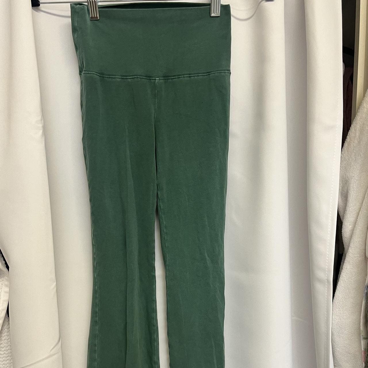 TNA aritzia green flare yoga pants no flaws and so... Depop