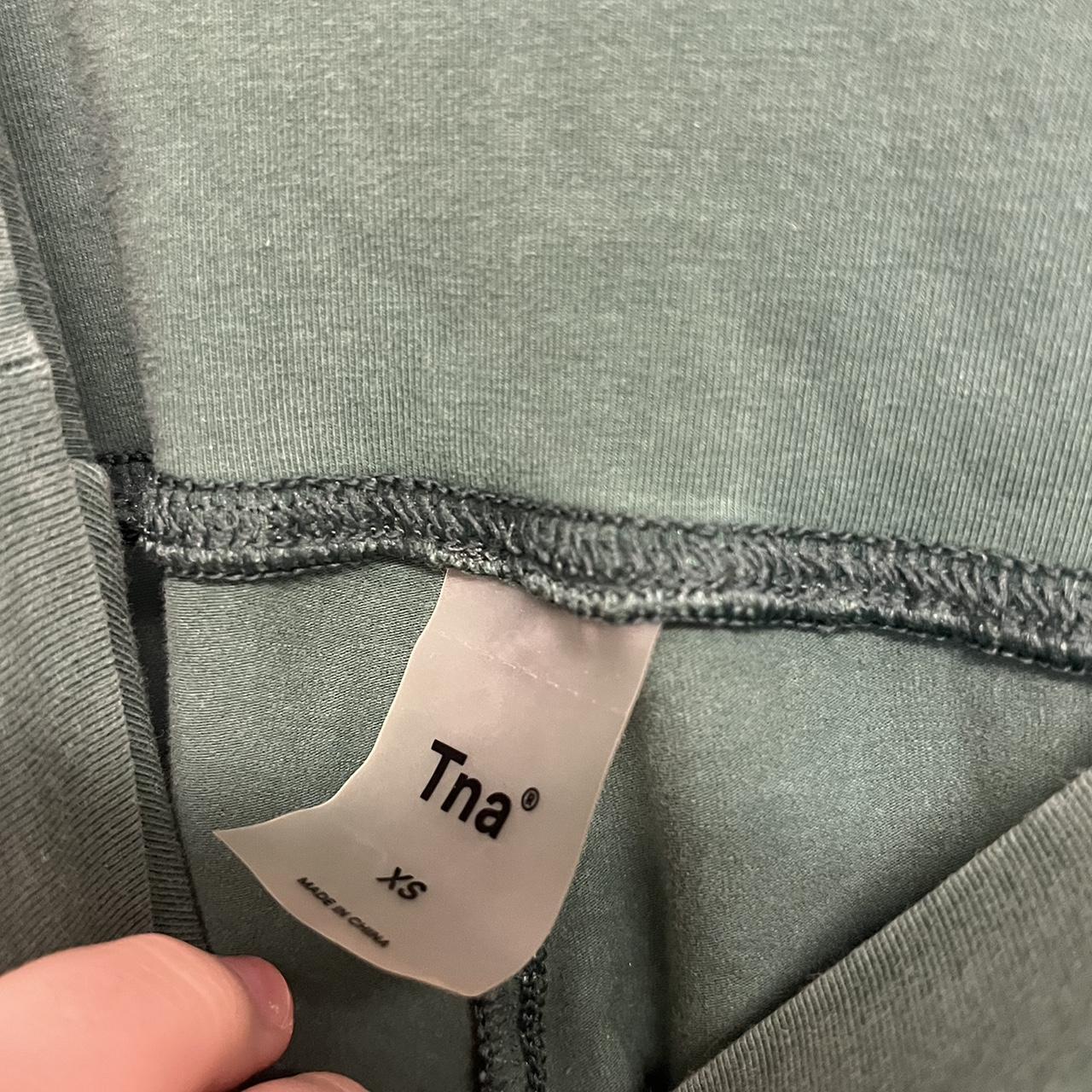 TNA aritzia green flare yoga pants no flaws and so... Depop