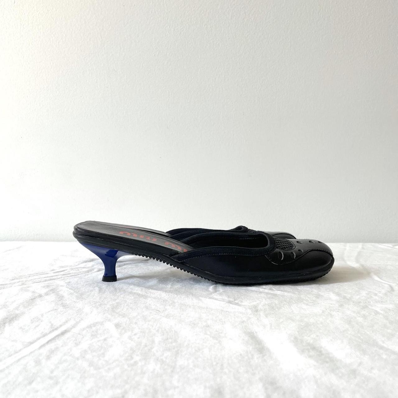 靴 MIU MIU Leather Mules 36 1/2 Leather mules in black - Miu Miu | Mytheresa