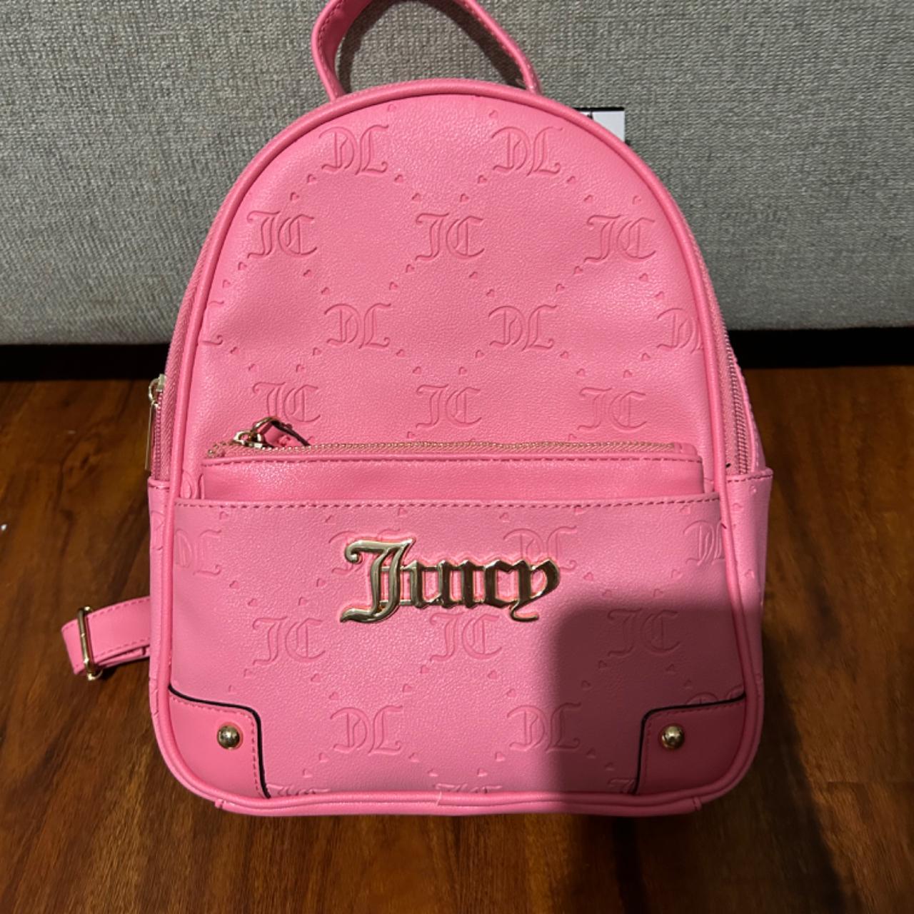 Pink juicy couture book bag, with a wallet all,