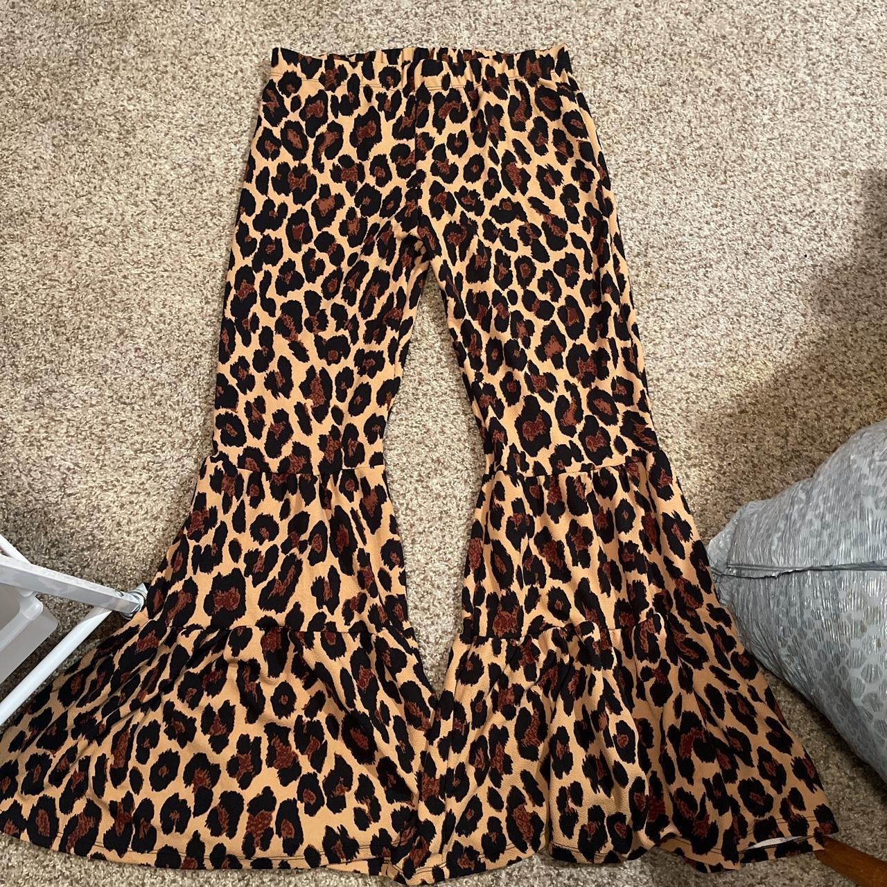 XL Cheetah bell bottoms, only worn to try on. Would... - Depop