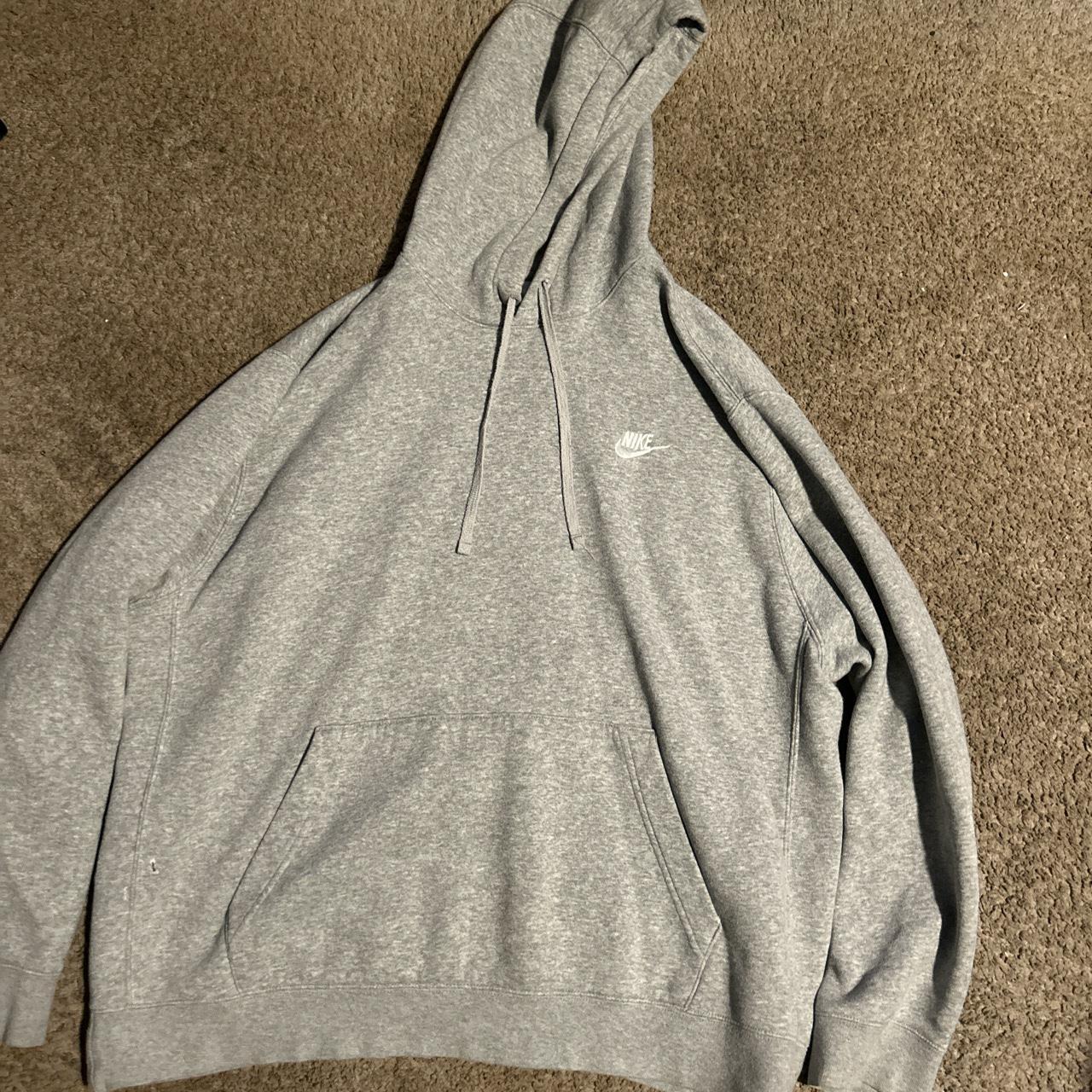 Nike Hoodie size XL, small hole on right... - Depop