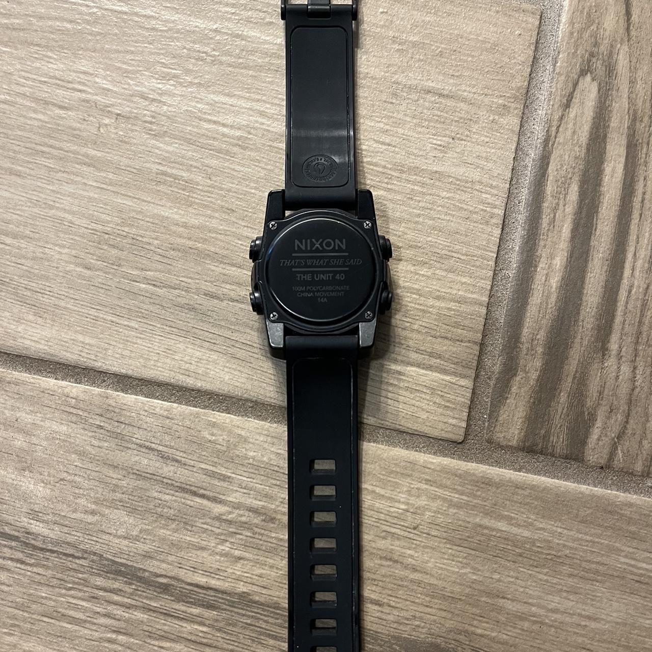 Nixon black watch with a digital face and a black. Depop