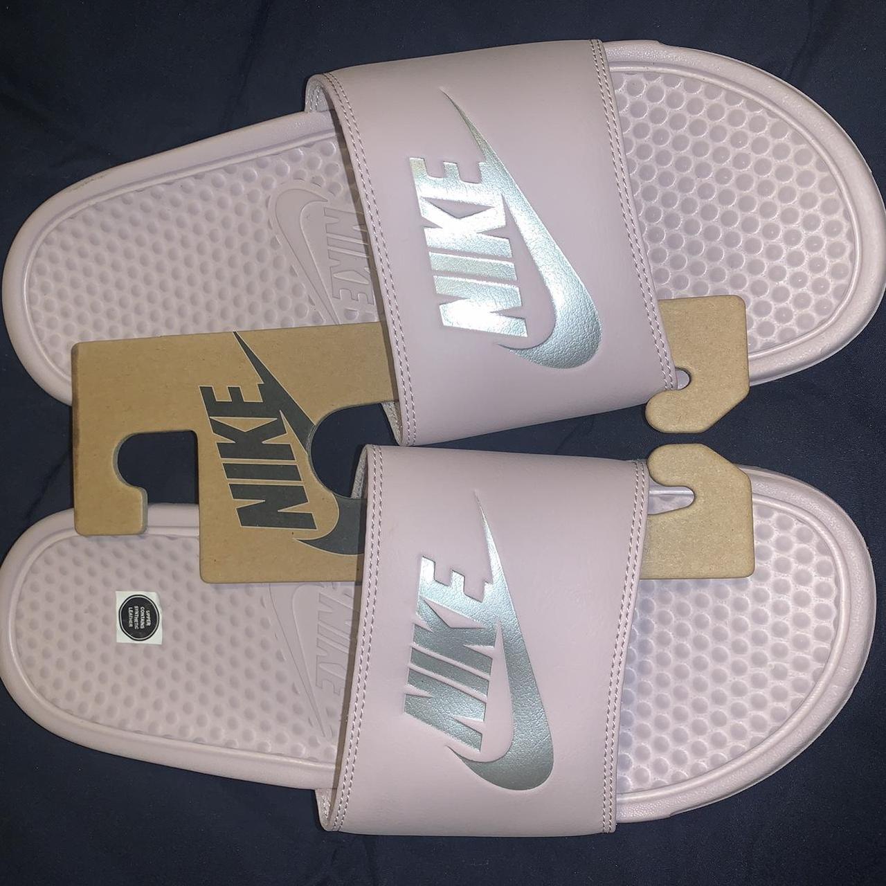 Nike light pink slides size 11 women s. Never worn Depop