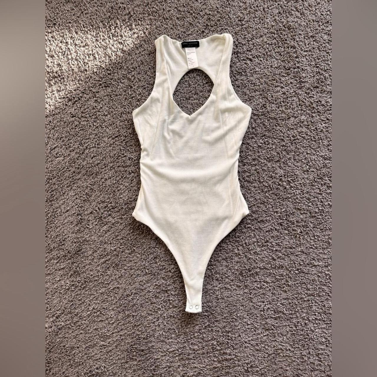 Nvr worn: 88%rayon 12% spandex it is a bodysuit with... - Depop