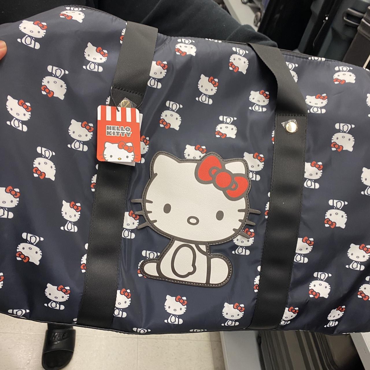 Hello Kitty black waterproof vinyl wraparound - Depop