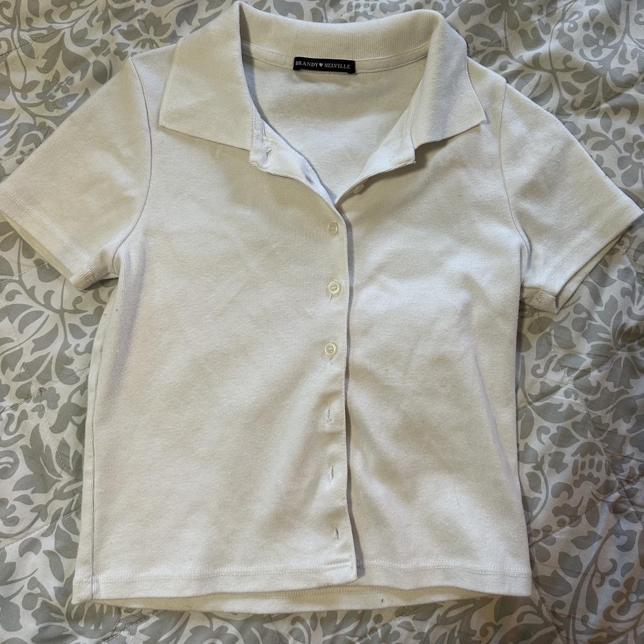 Brandy Melville white button top Never - Depop