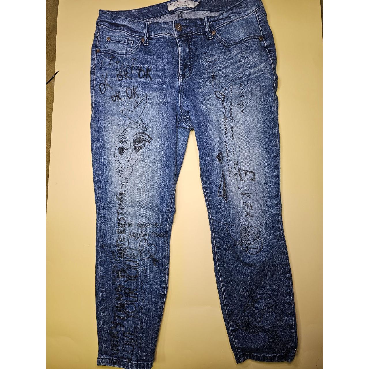 Cute Torrid jeans with some drawing graphics on... - Depop