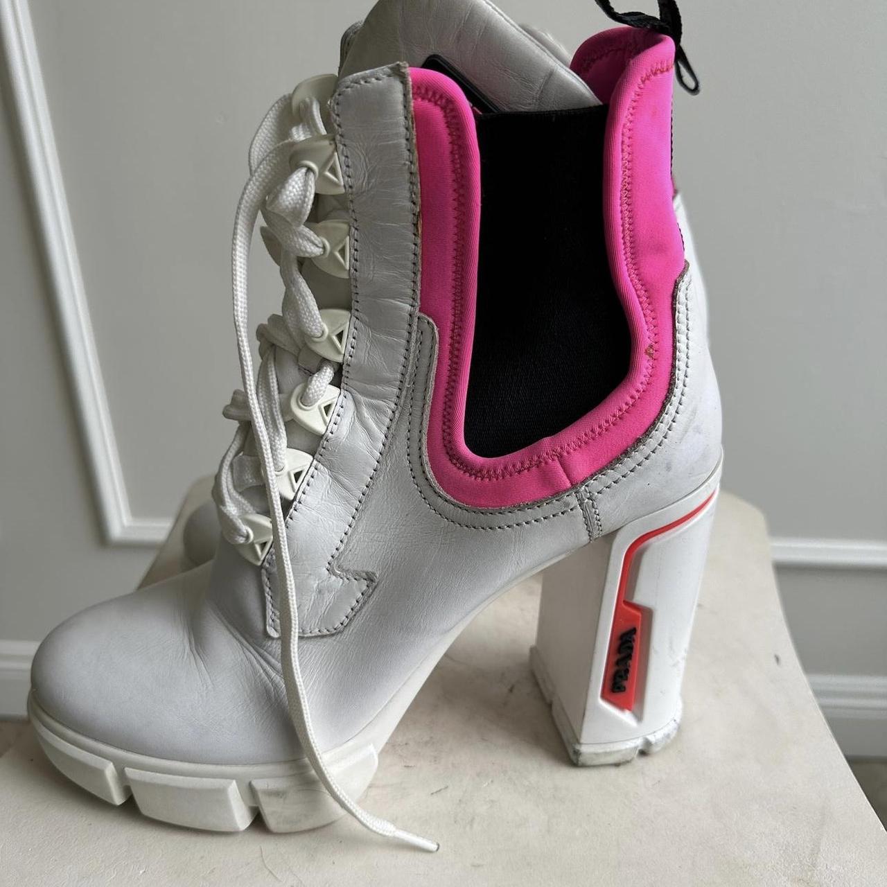 Pink and white prada boots on sale