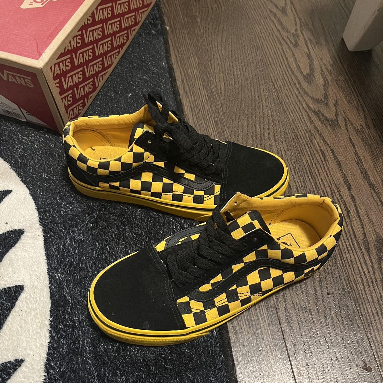 Yellow and Black checkered vans. These were worn