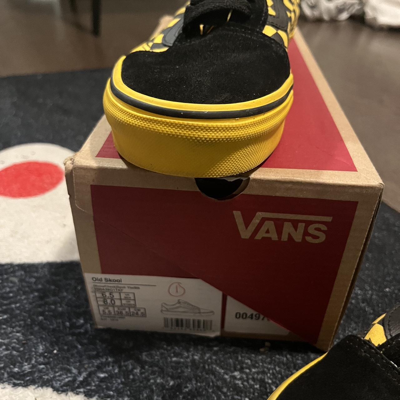 Yellow and Black checkered vans. These were worn