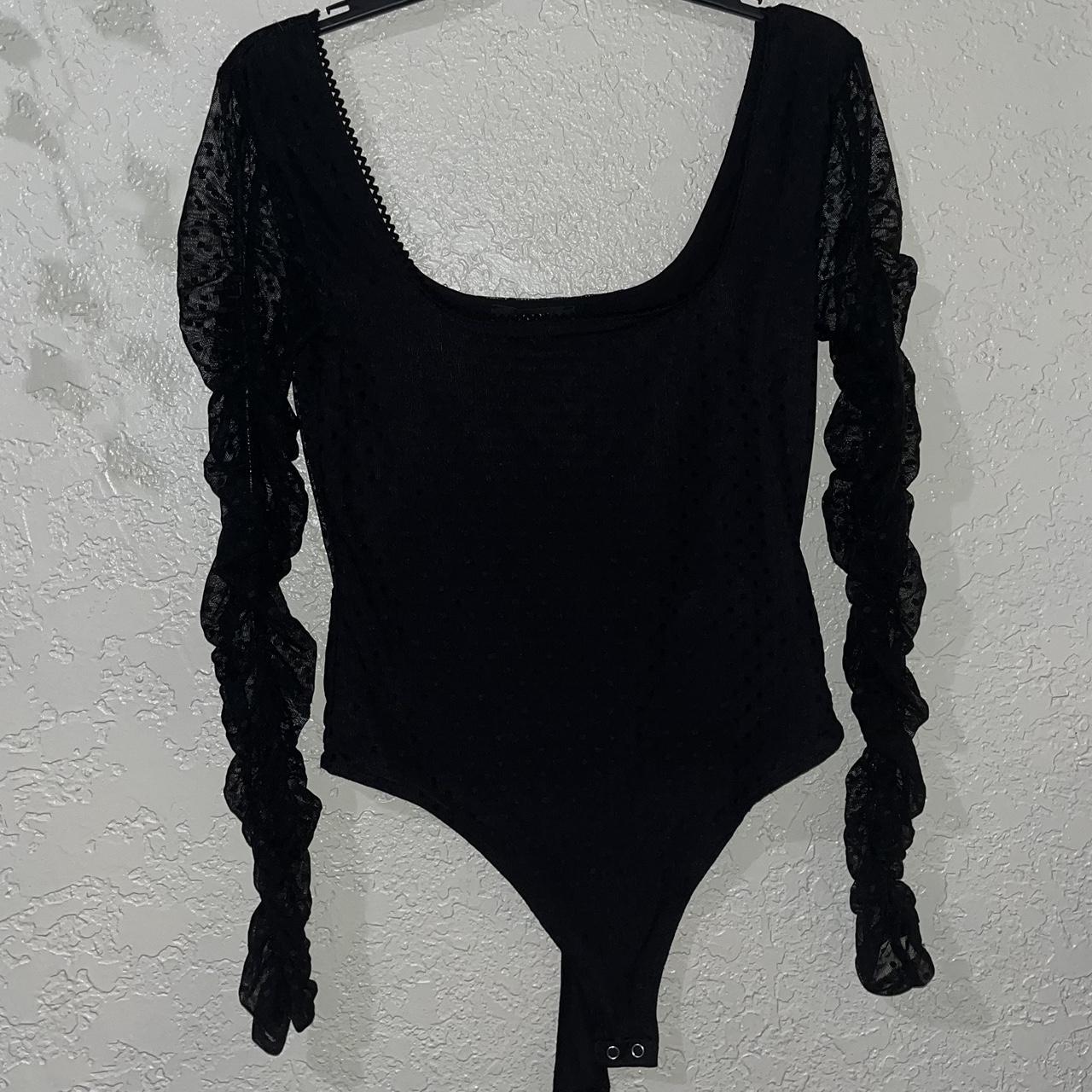 medium black thong bodysuit with laced long sleeve - Depop