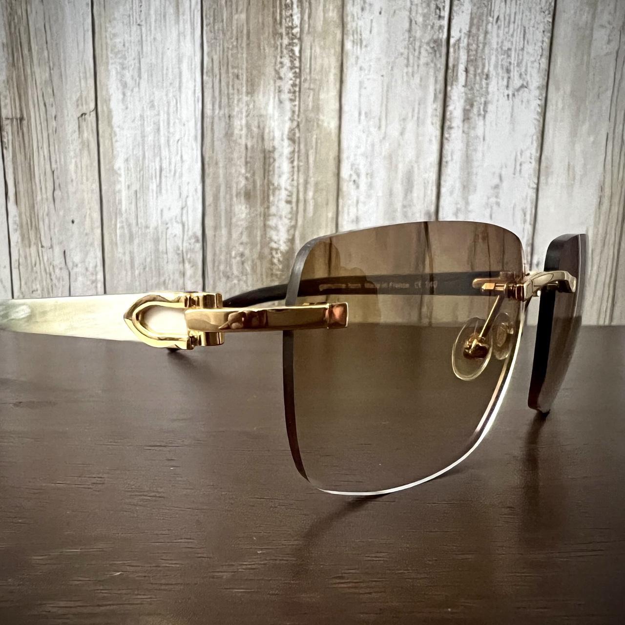 Cartier Glasses CT00920 Big C Wire Eyeglasses Piccadilly Gold Rimless –  Celebrities Eyeglasses