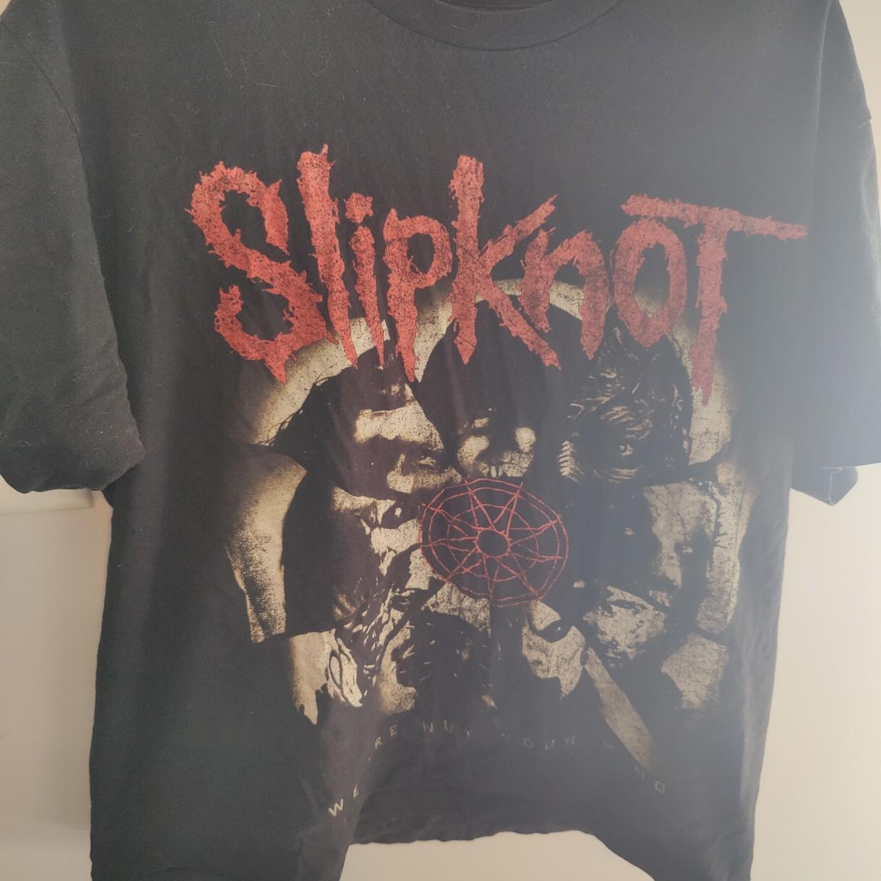 SLIPKNOT band T-shirt has a small hole in the side - Depop