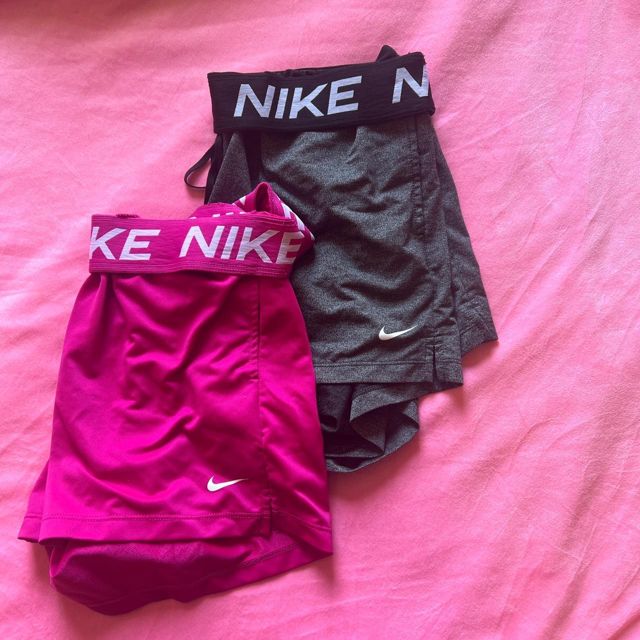 Two medium dri fit Nike shorts Women pink and... - Depop