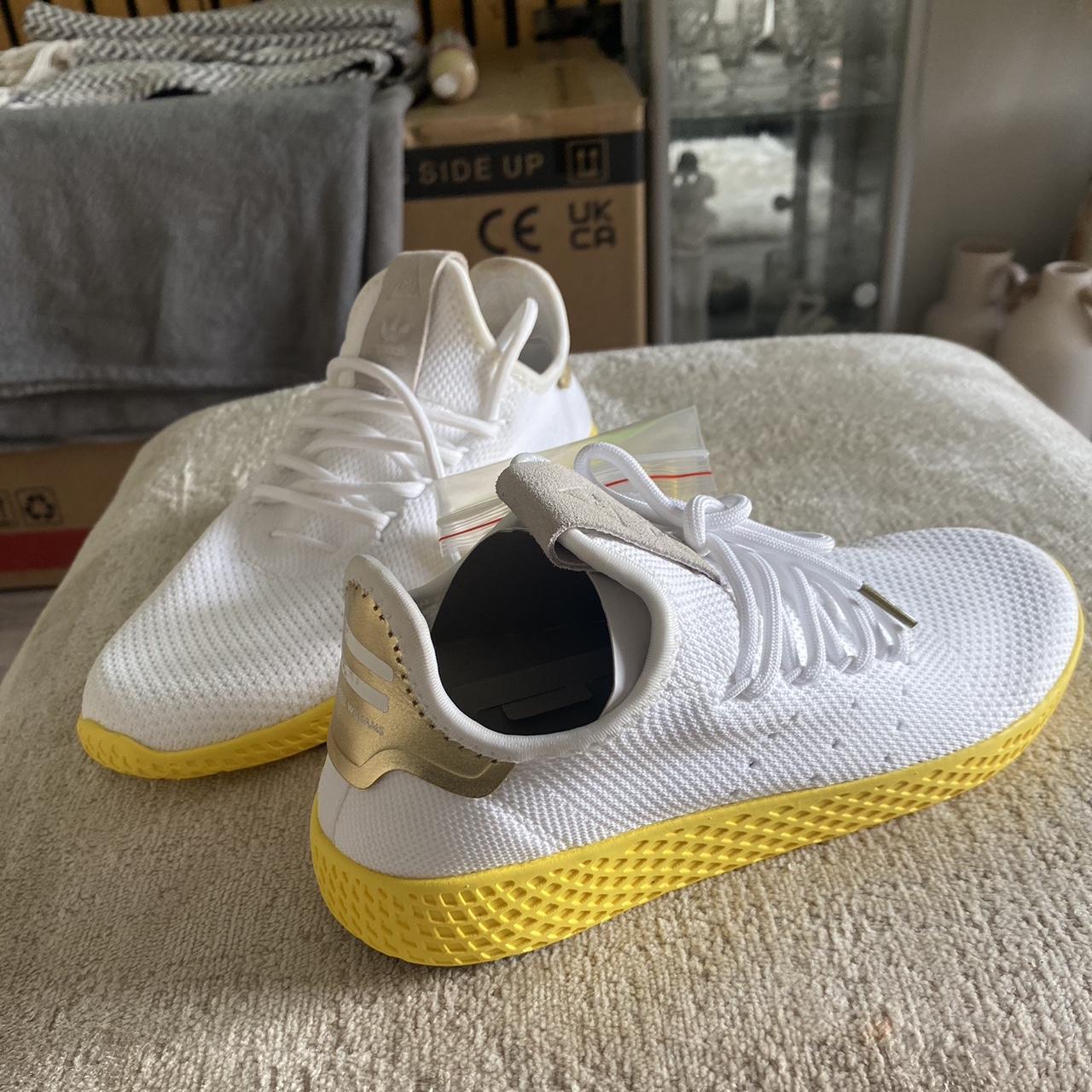 Adidas originals pharrell hu sale trainers in white and yellow